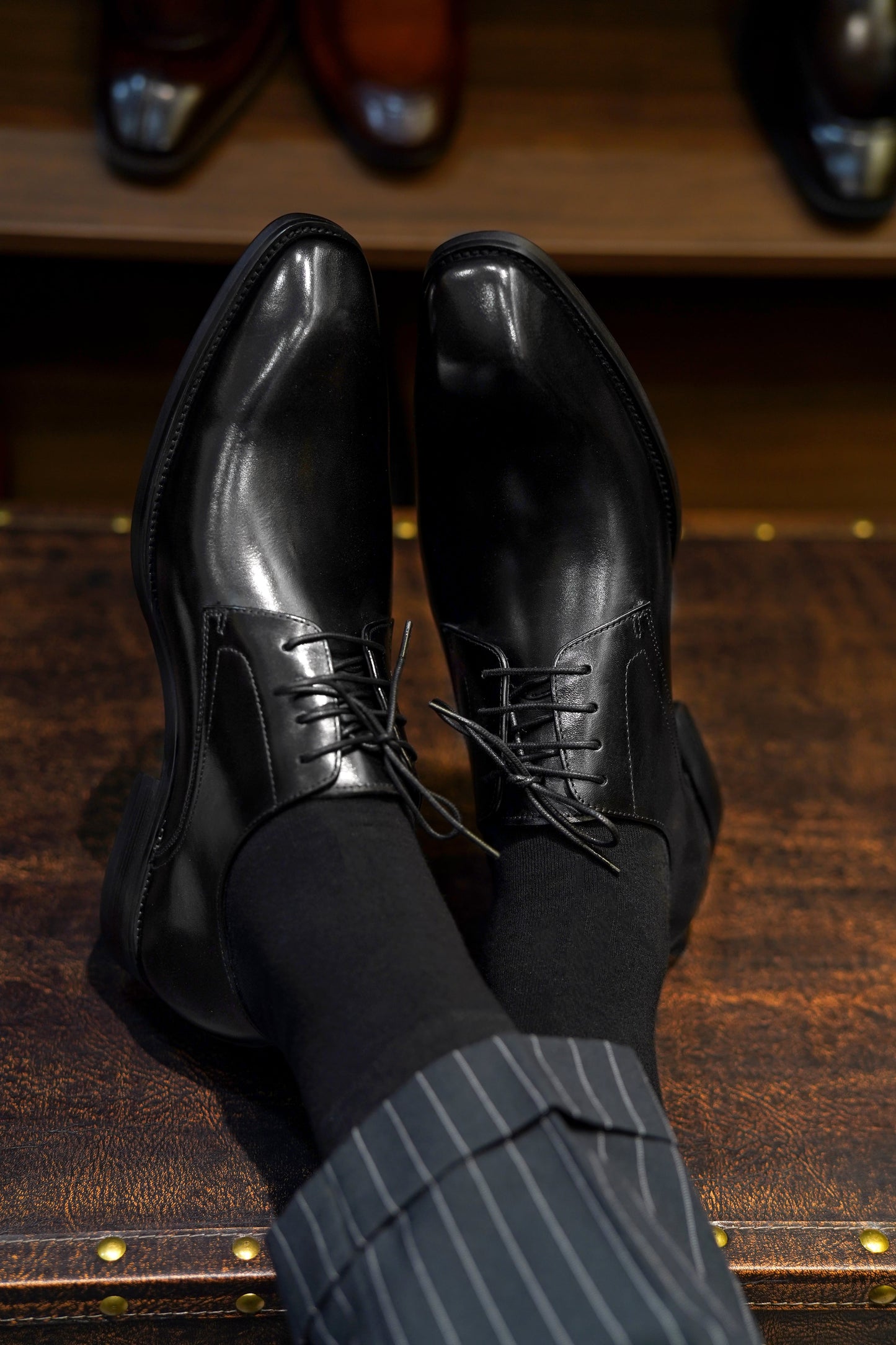 A pair of Classic Black Derby Shoes, crafted from premium leather, perfect for men’s formal and business wear.
