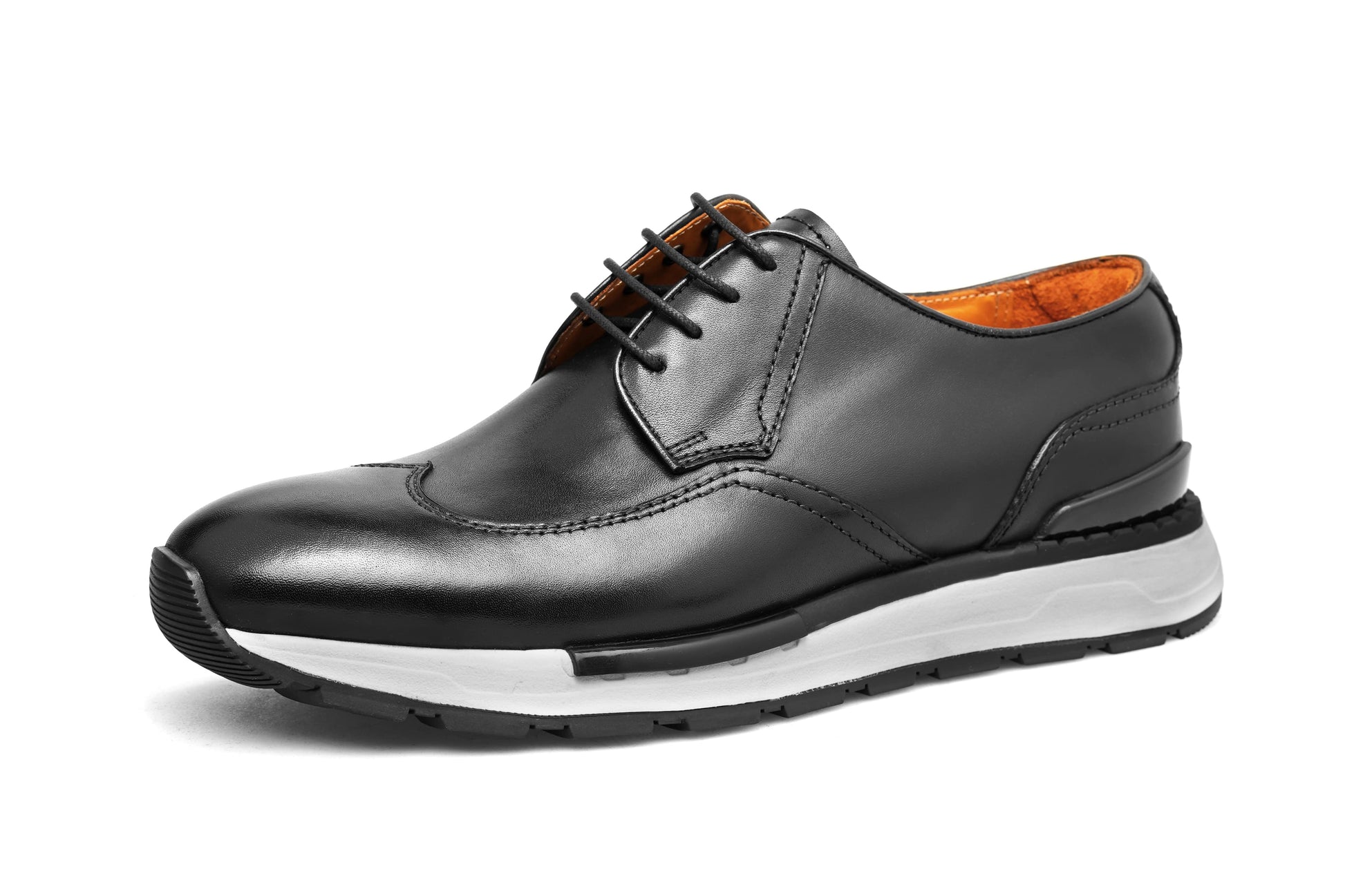 Black leather shoe with white sole on a white background