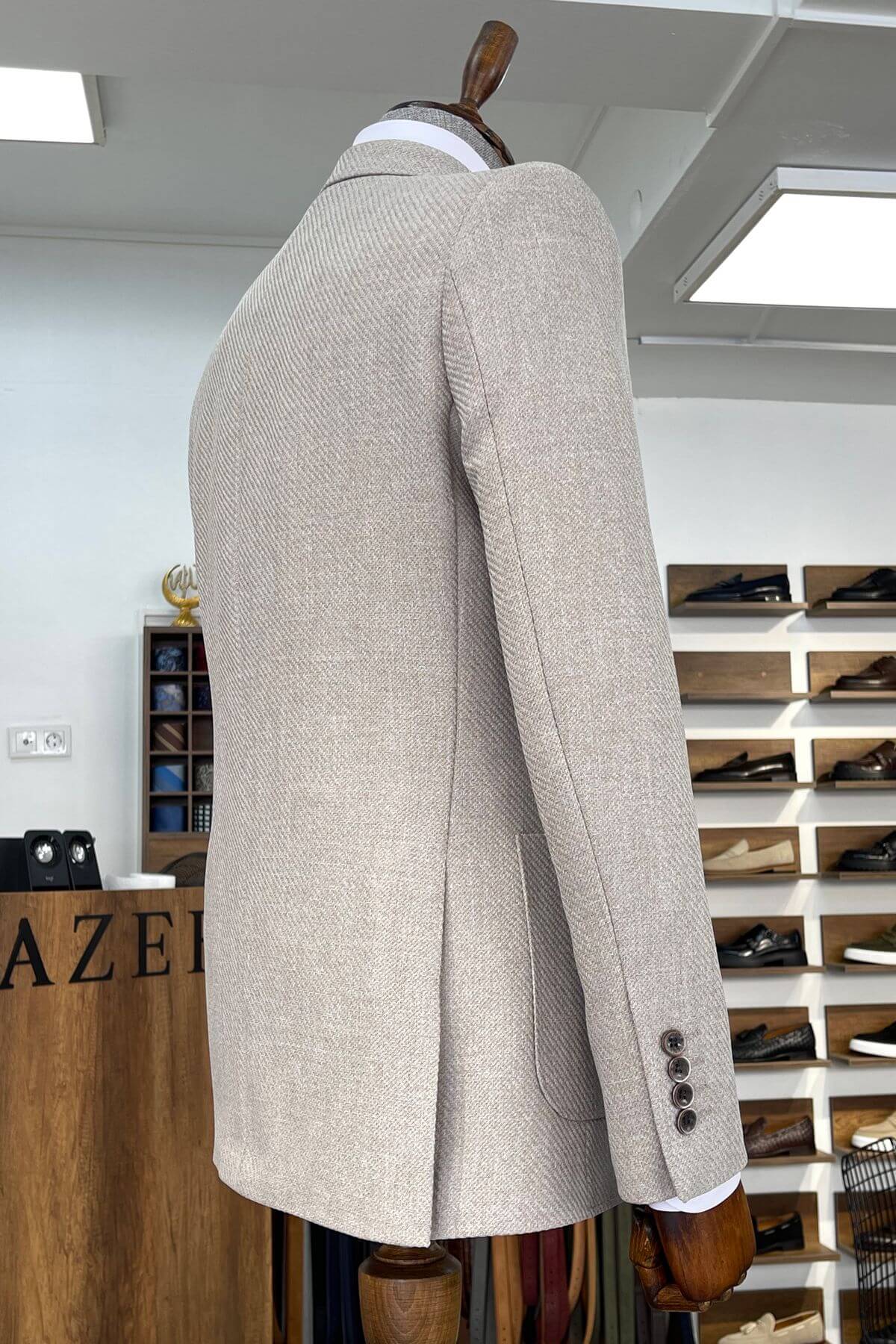 Slim-fit Wool Blend Self-Patterned Blazer in Beige on a mannequin in a store setting