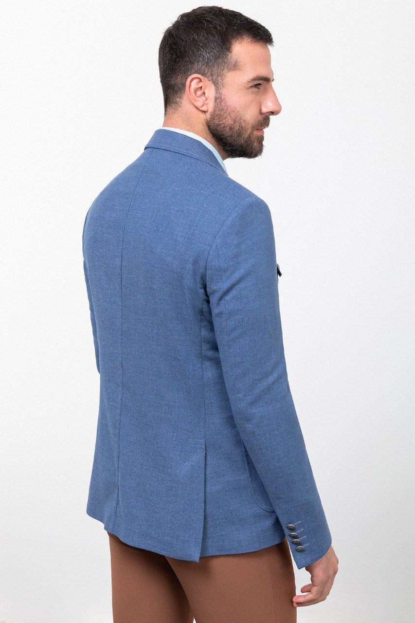 Man wearing a blue blazer with brown trousers , perfect for smart-casual or business-casual attire.