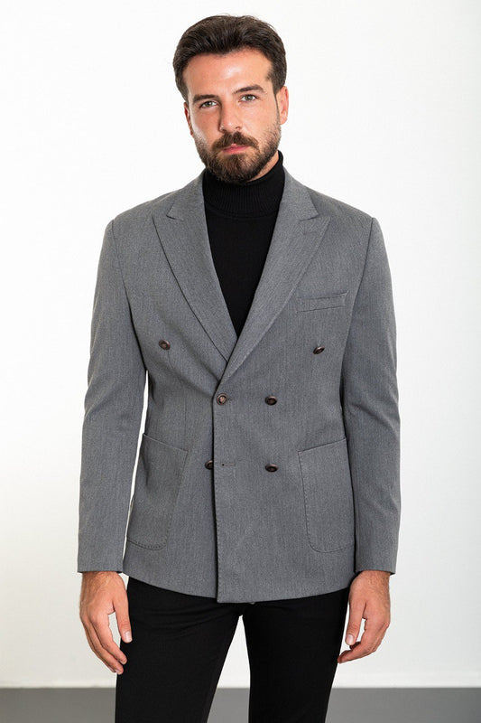 Man wearing a grey double-breasted blazer paired with a black turtleneck, ideal for smart-casual and formal occasions.
