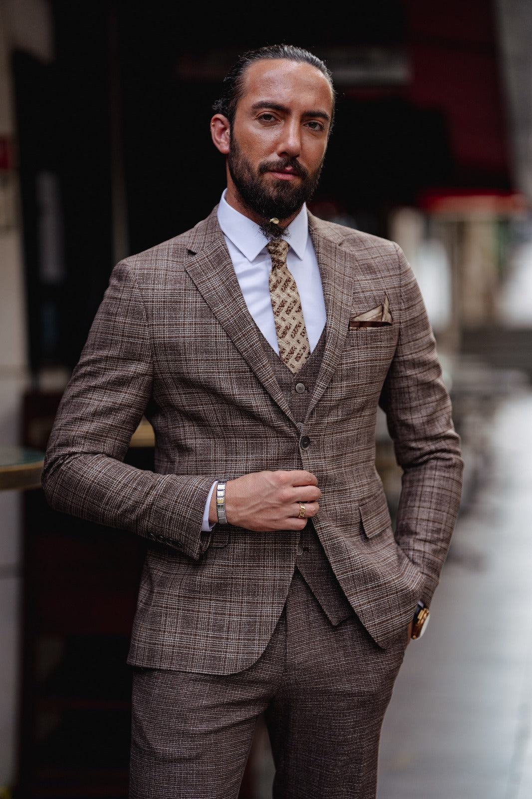 A Brown Slim Fit Plaid Detailed Suit on display.