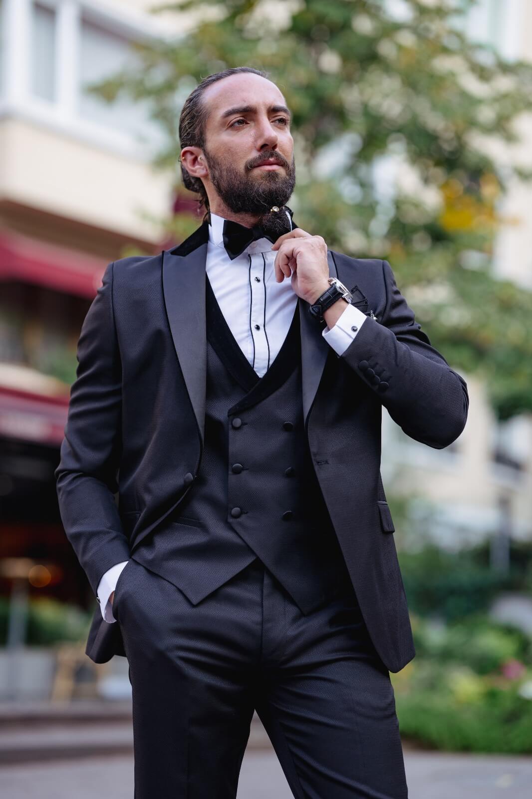 A Slim Fit Black Tuxedo on display.