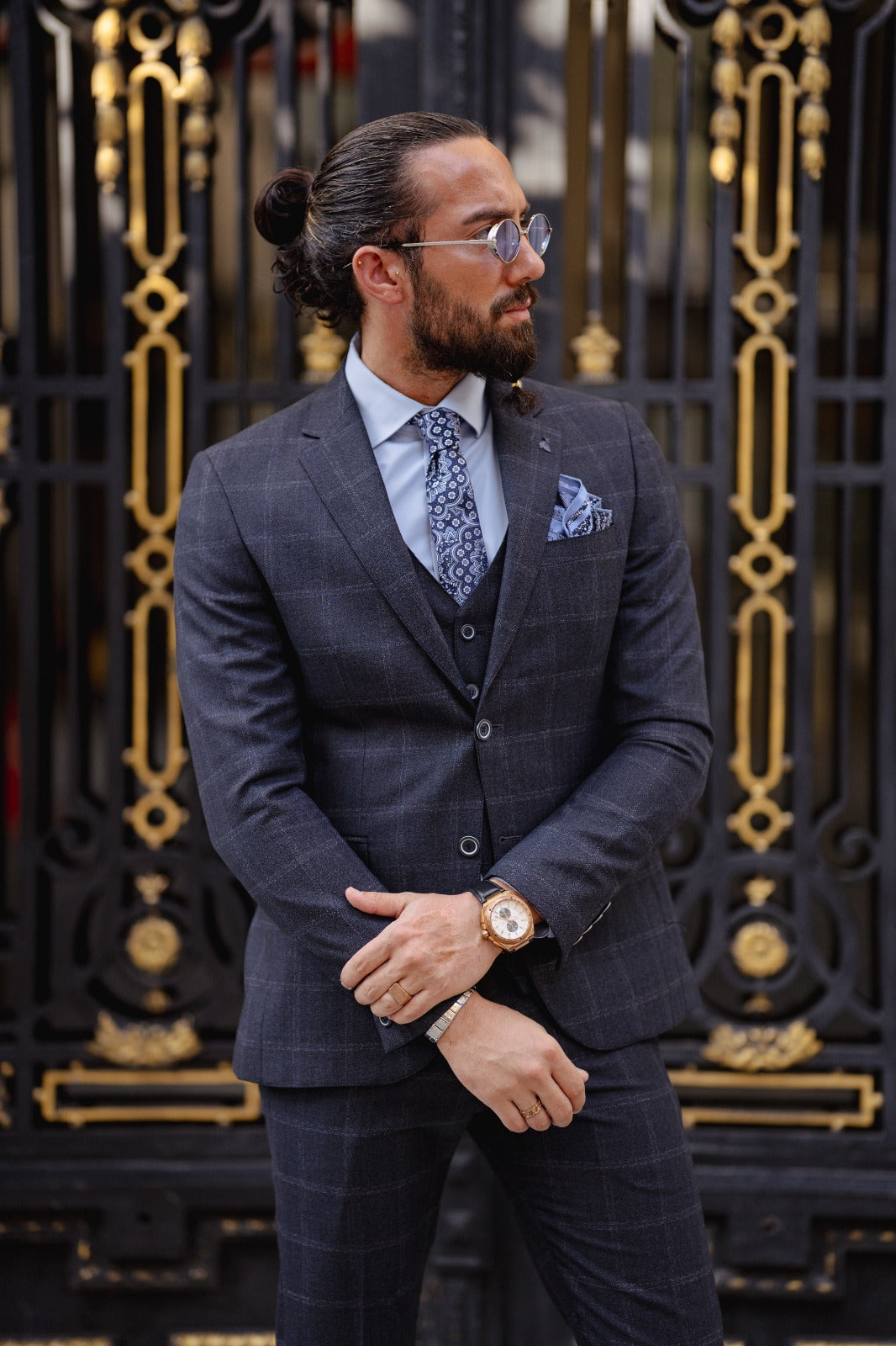 A Navy blue Slim Fit Plaid Detailed Suit on display.