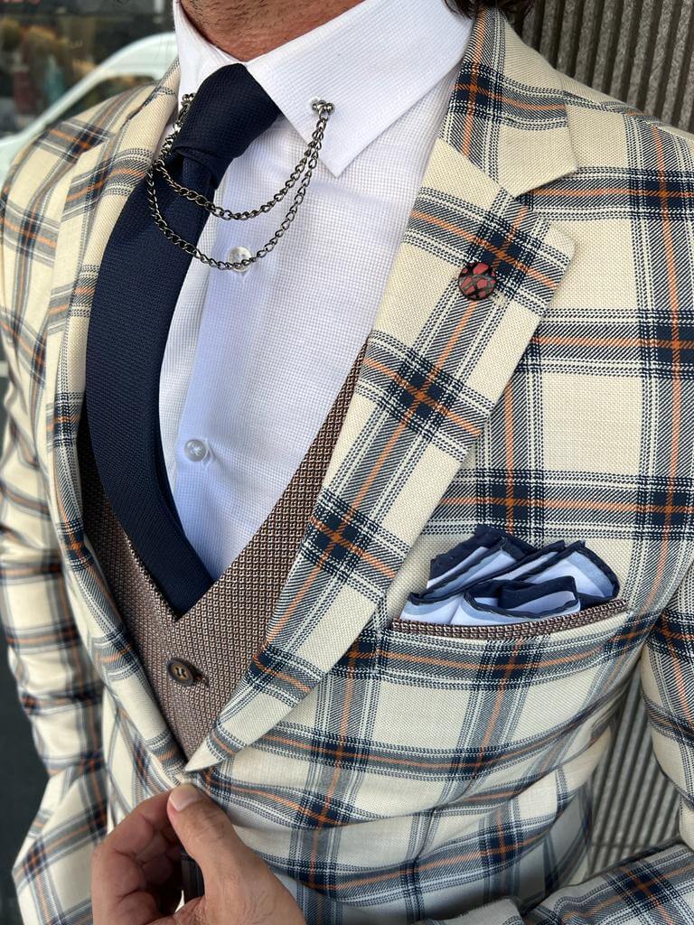 Men's patterned beige wedding suit with a modern twist.