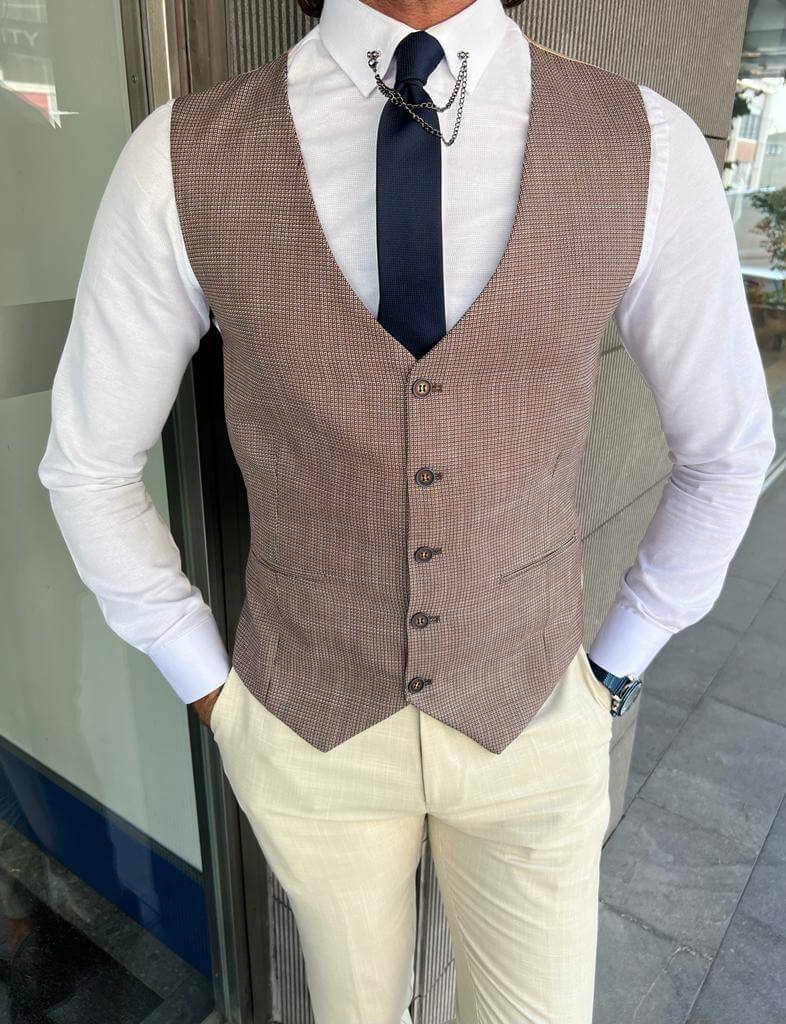 Men's patterned beige wedding suit with a modern twist.