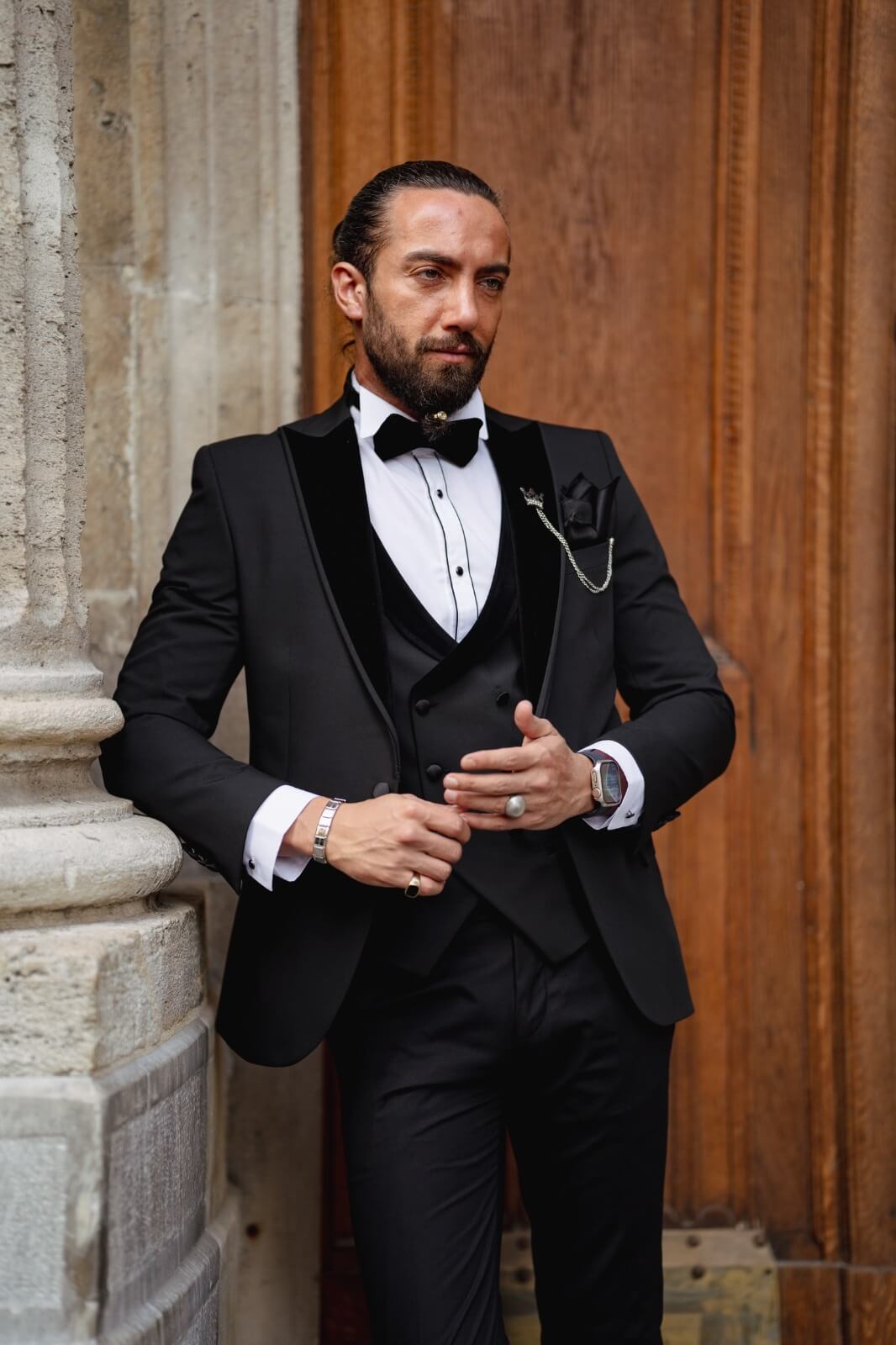 A Velvet Collar Tuxedo Black Suit on display.