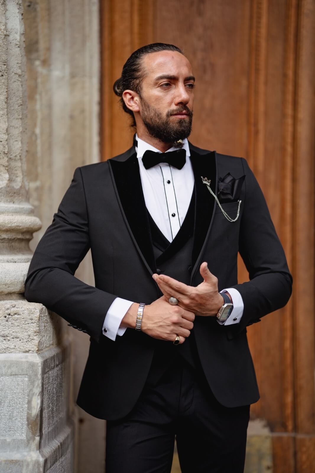 A Velvet Collar Tuxedo Black Suit on display.
