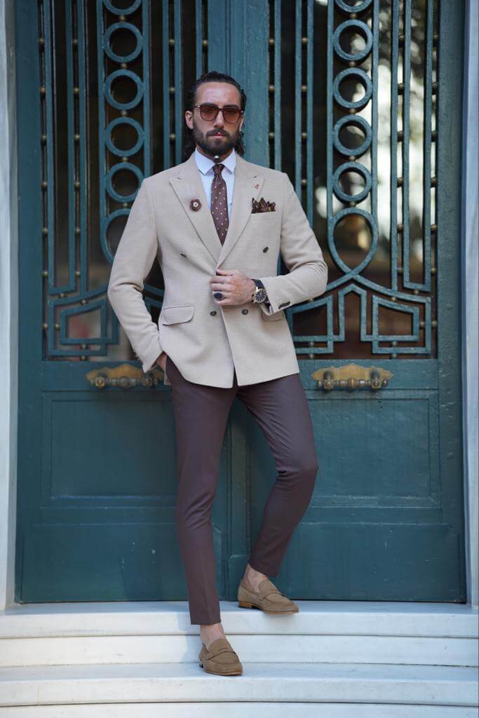 Classic beige blazer with a double-breasted closure