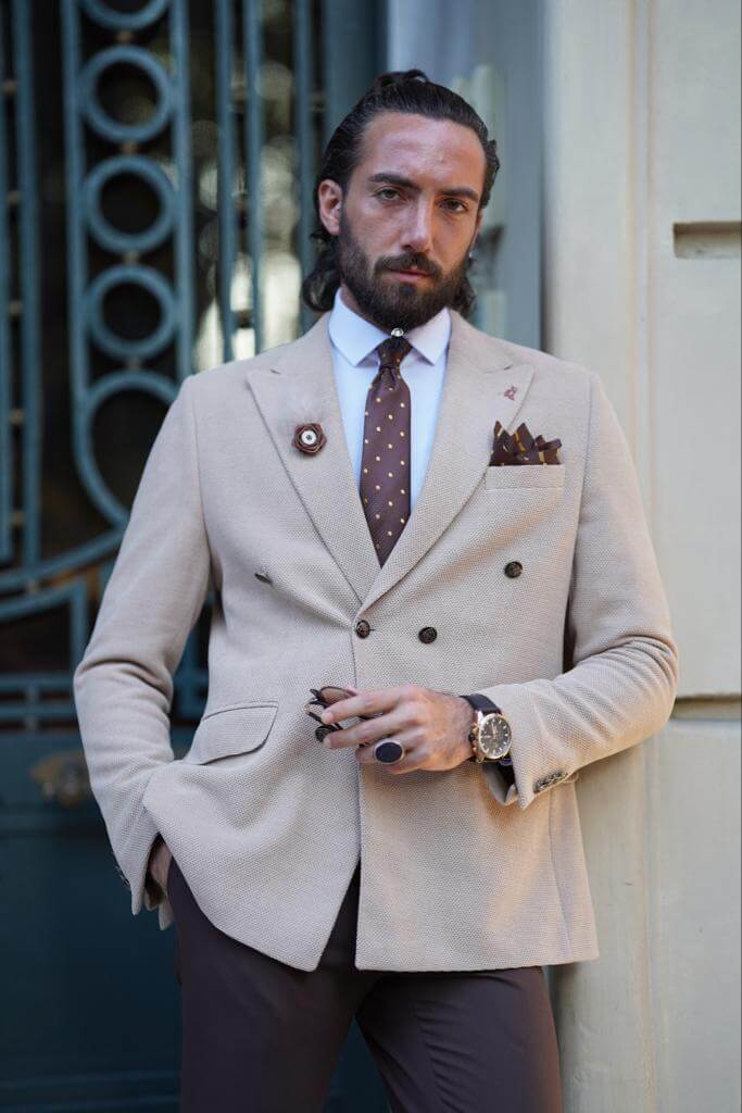 Classic beige blazer with a double-breasted closure