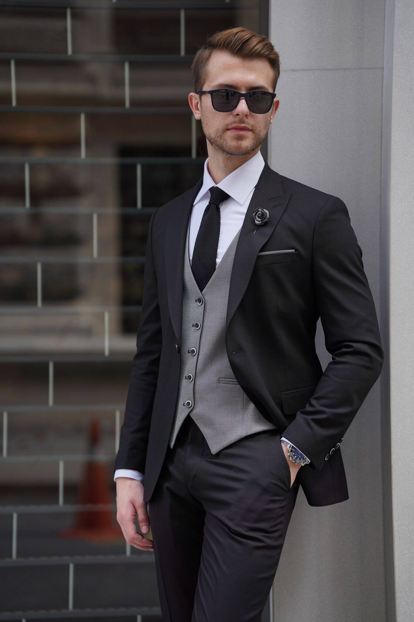 A Slim Fit Wool Black and Gray Suit on display.