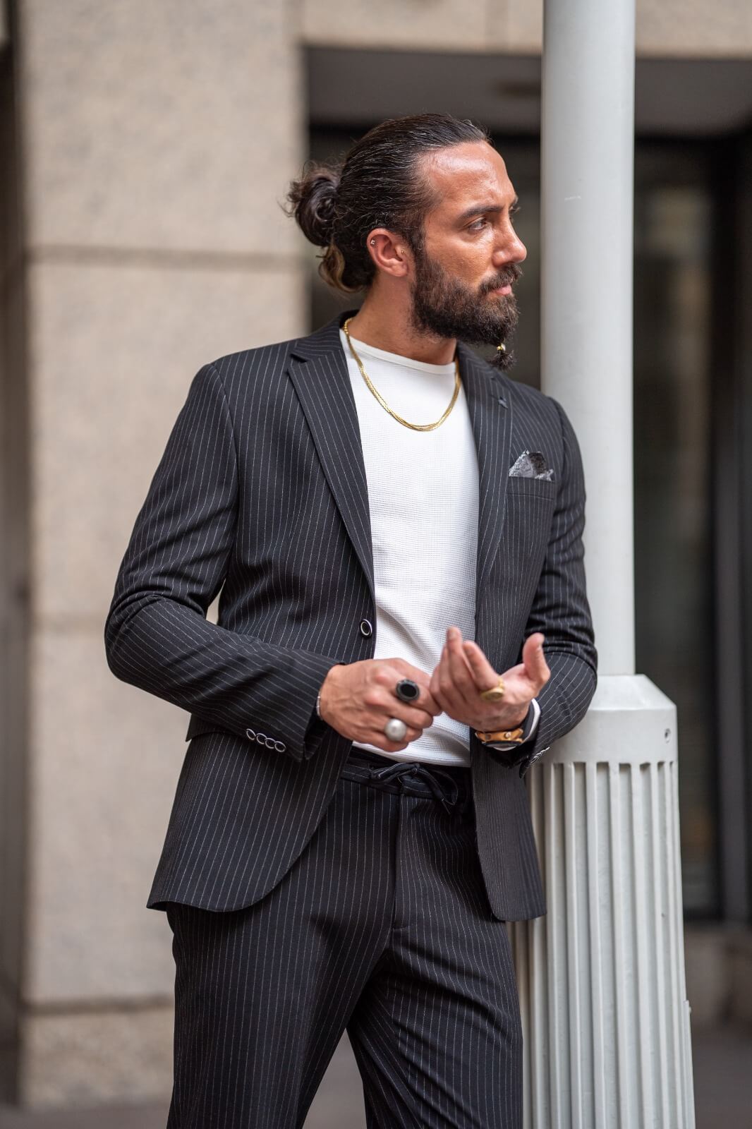Black men's suit with striped plaid pattern