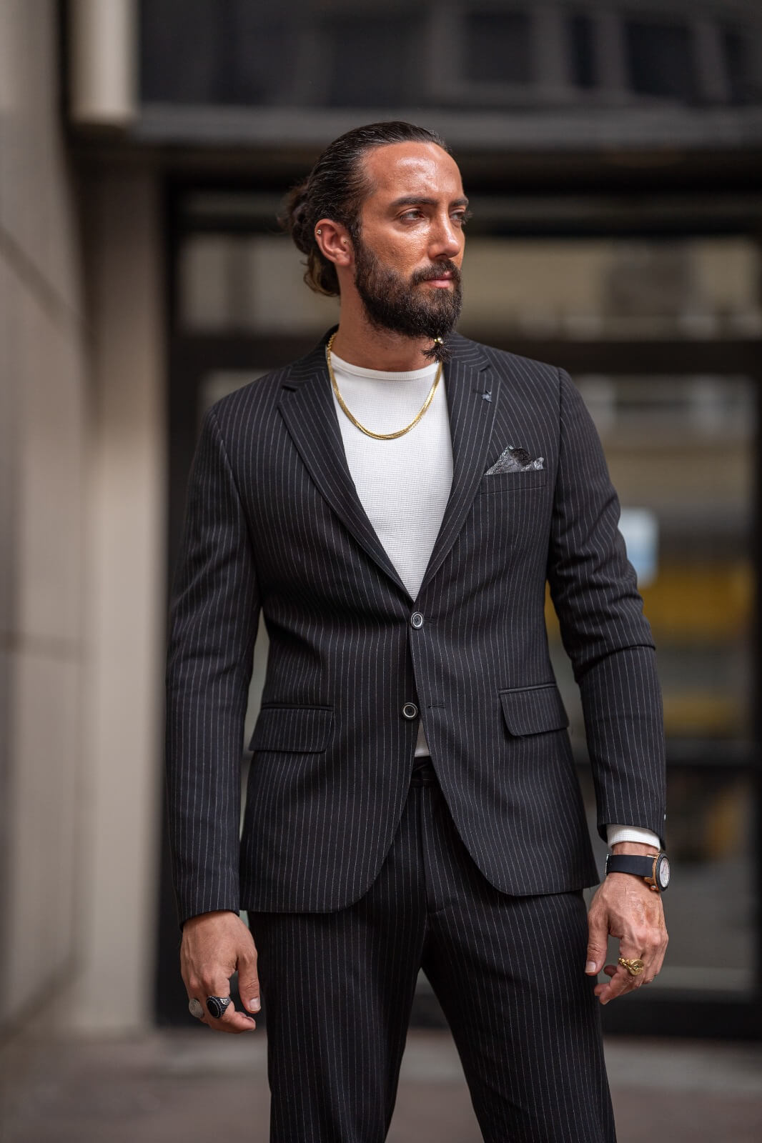 Black men's suit with striped plaid pattern