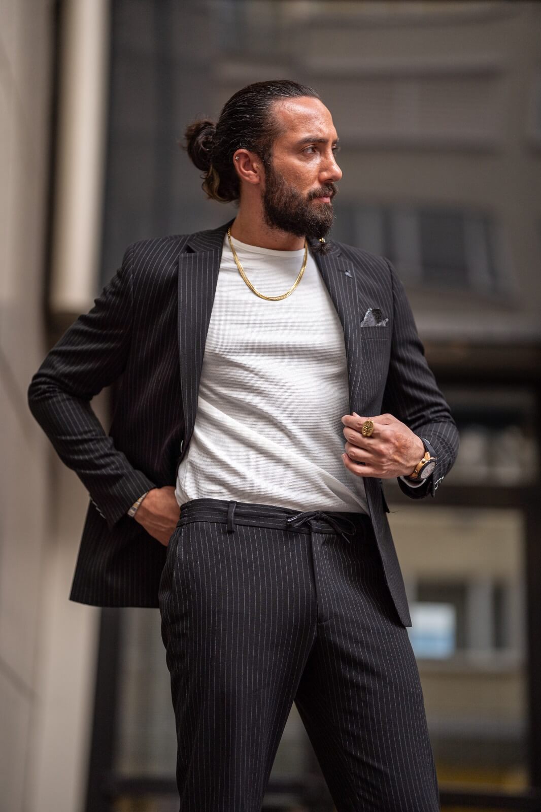 Black men's suit with striped plaid pattern