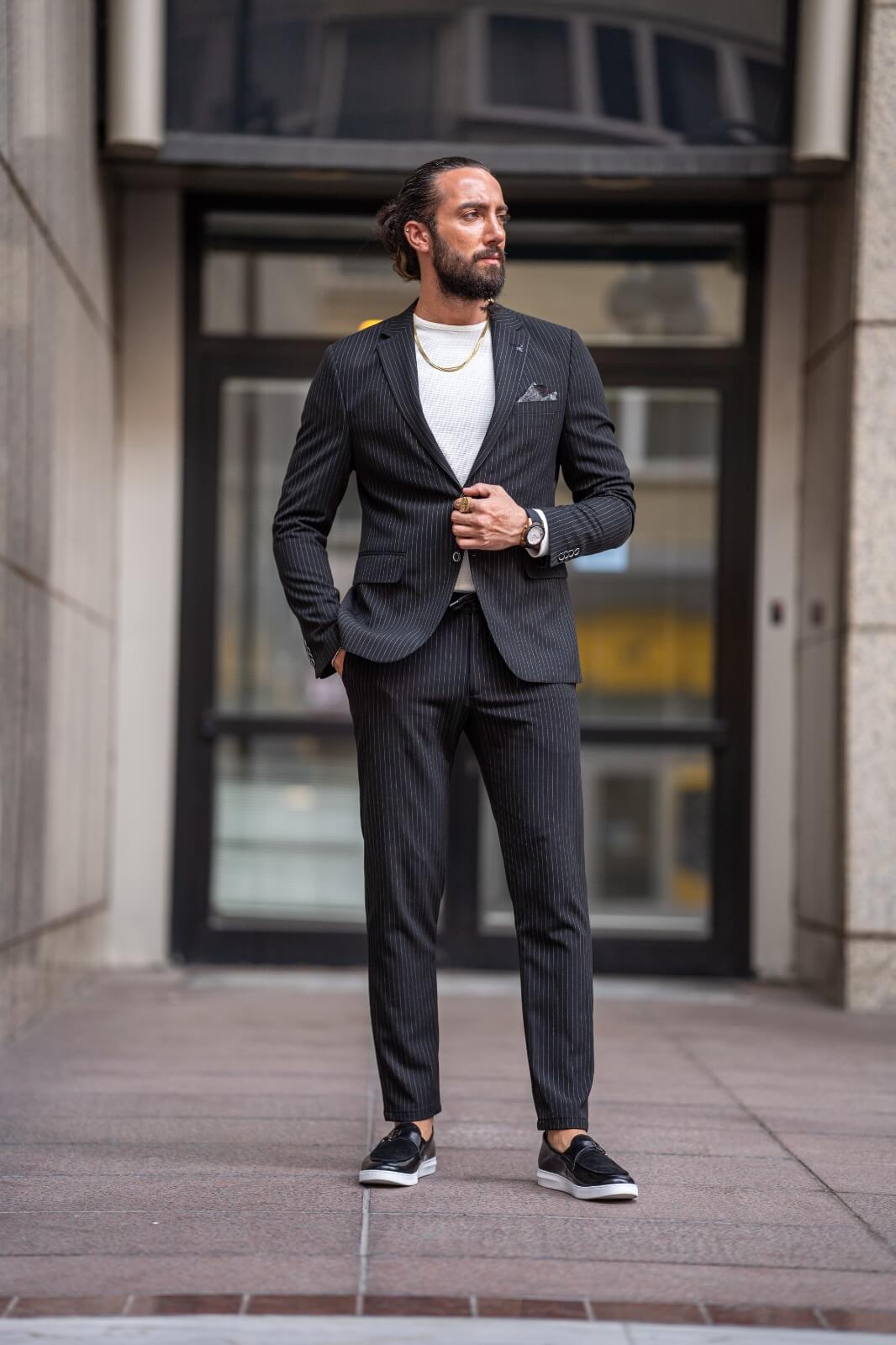 Black men's suit with striped plaid pattern