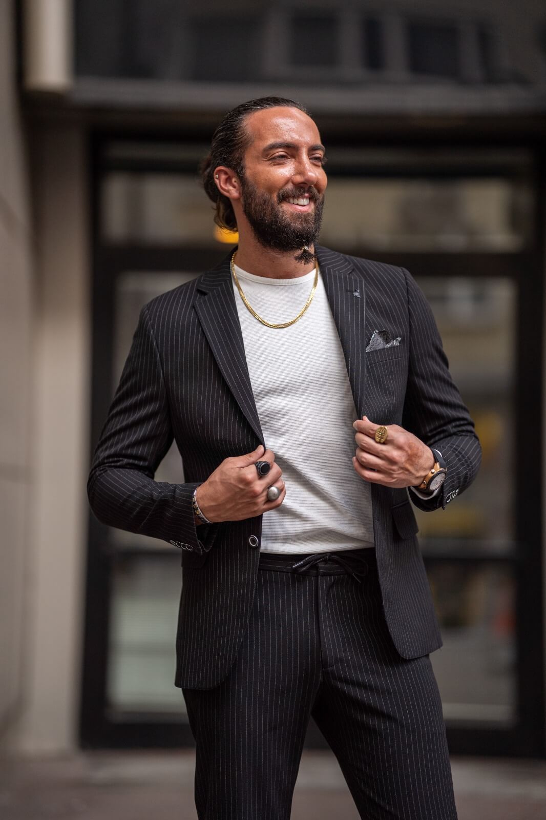 Black men's suit with striped plaid pattern
