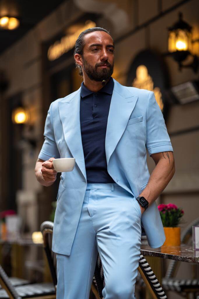 A Blue Short Sleeve Suit on display