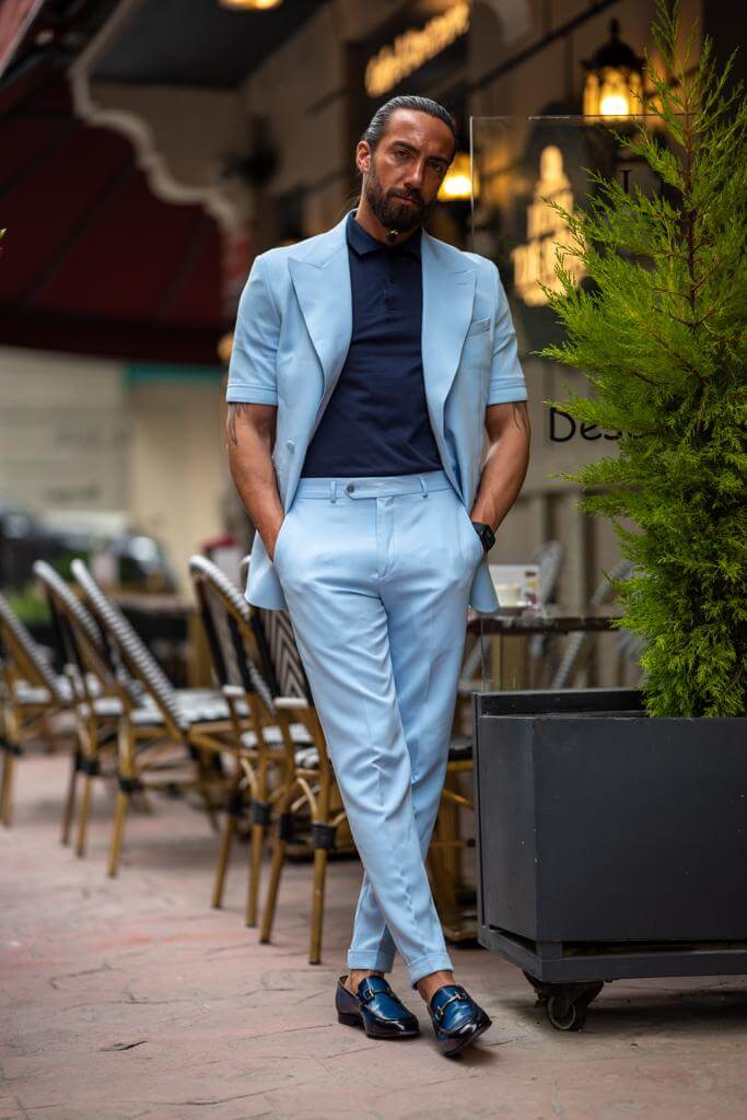 A Blue Short Sleeve Suit on display