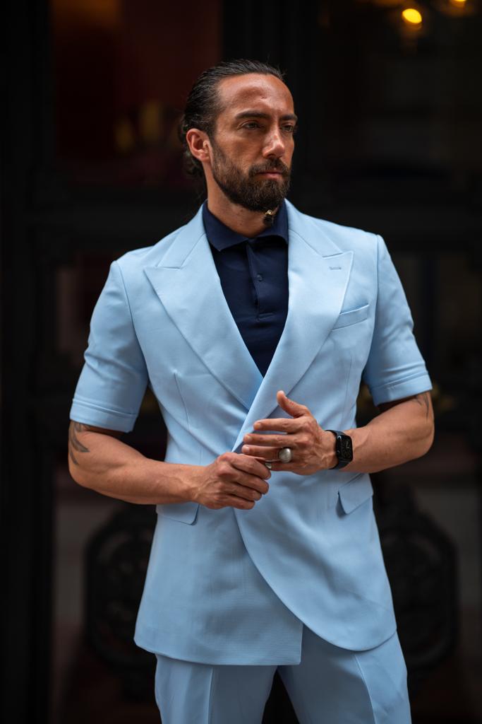 A Blue Short Sleeve Suit on display