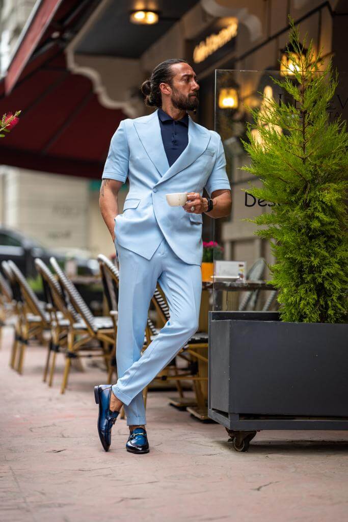 A Blue Short Sleeve Suit on display