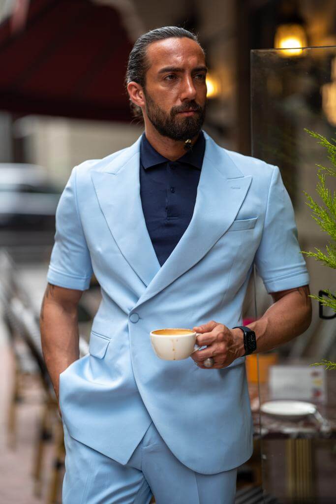 A Blue Short Sleeve Suit on display
