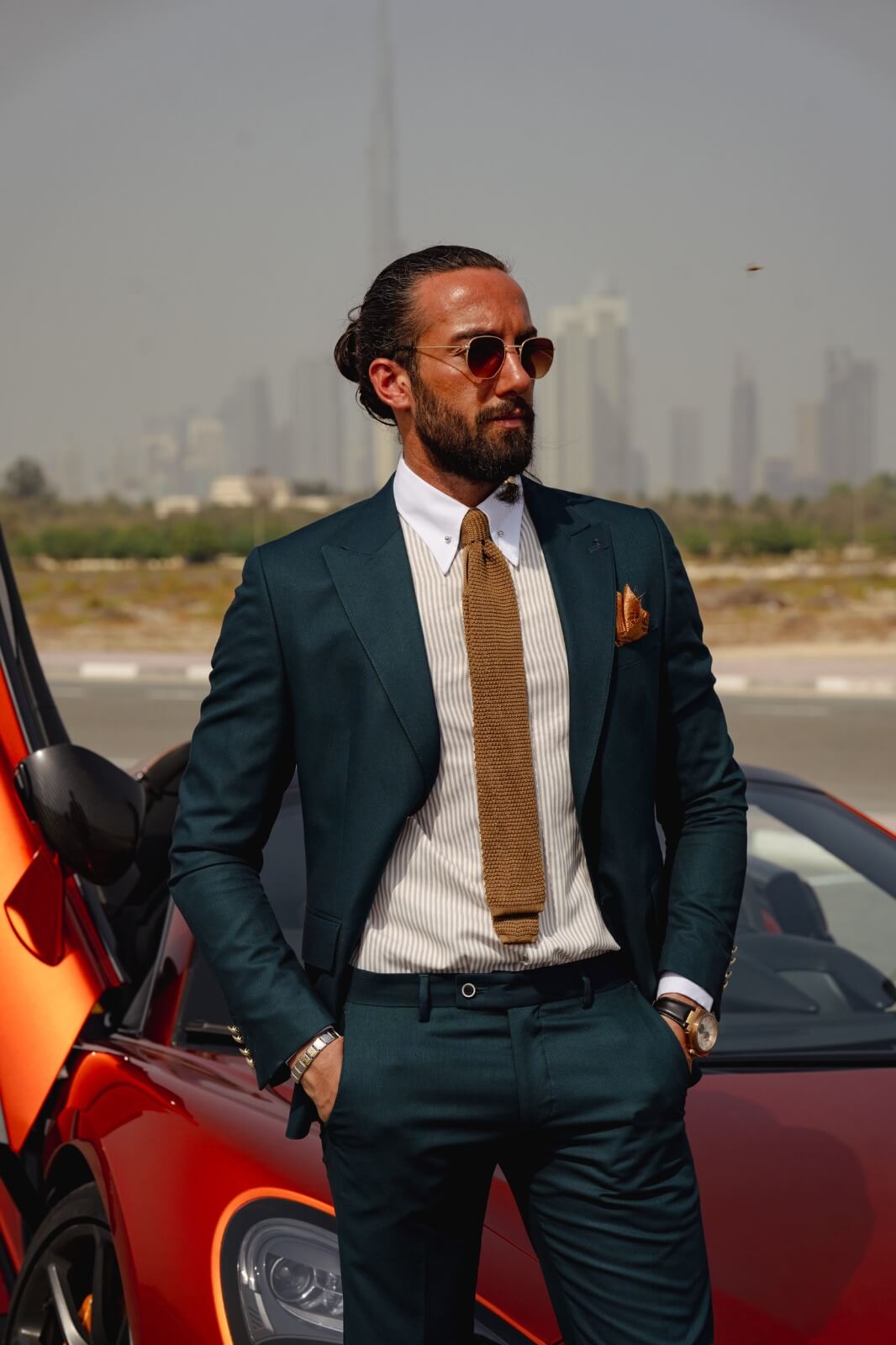 A Green Detailed Suit on display.