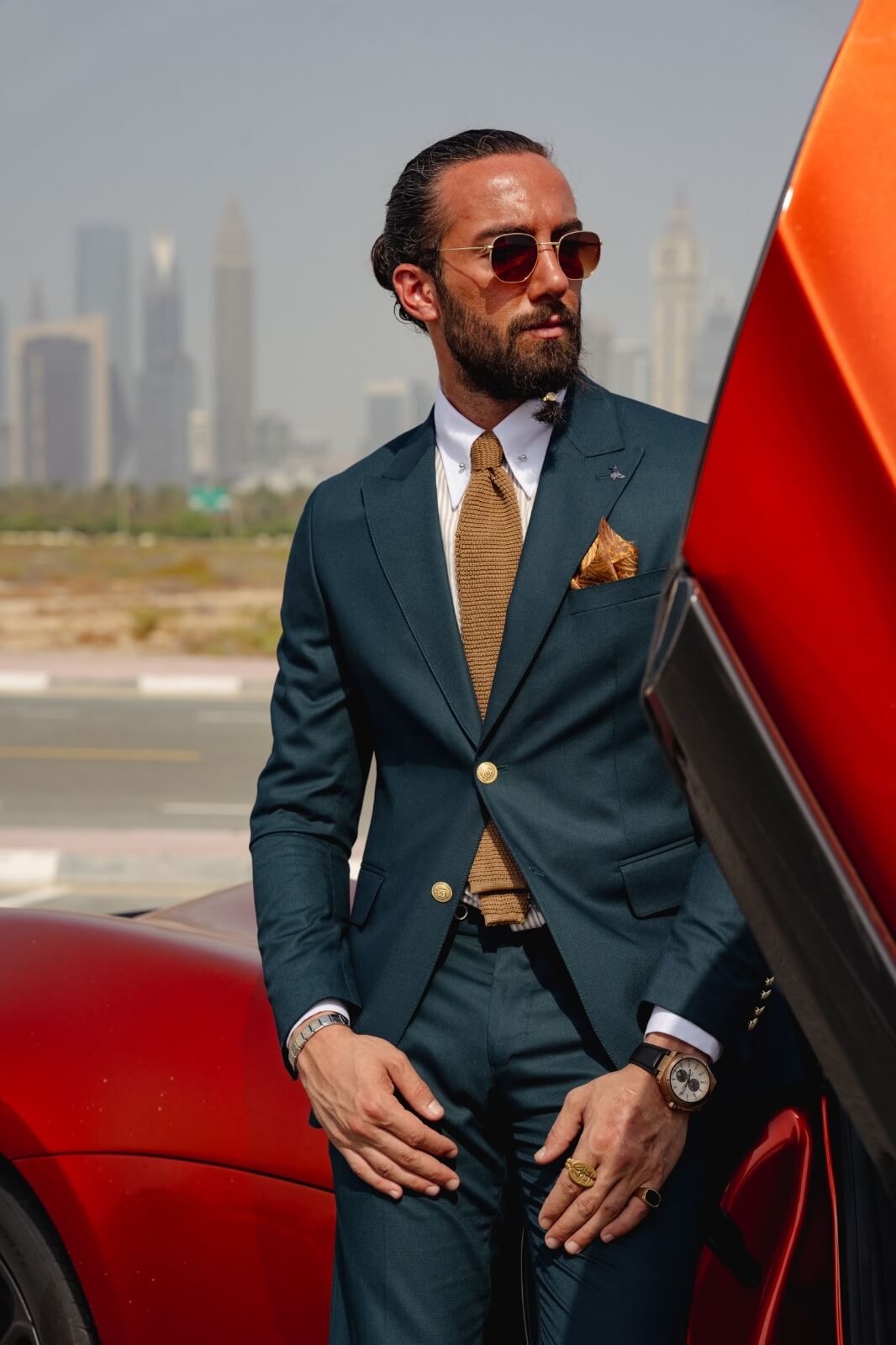 A Green Detailed Suit on display.
