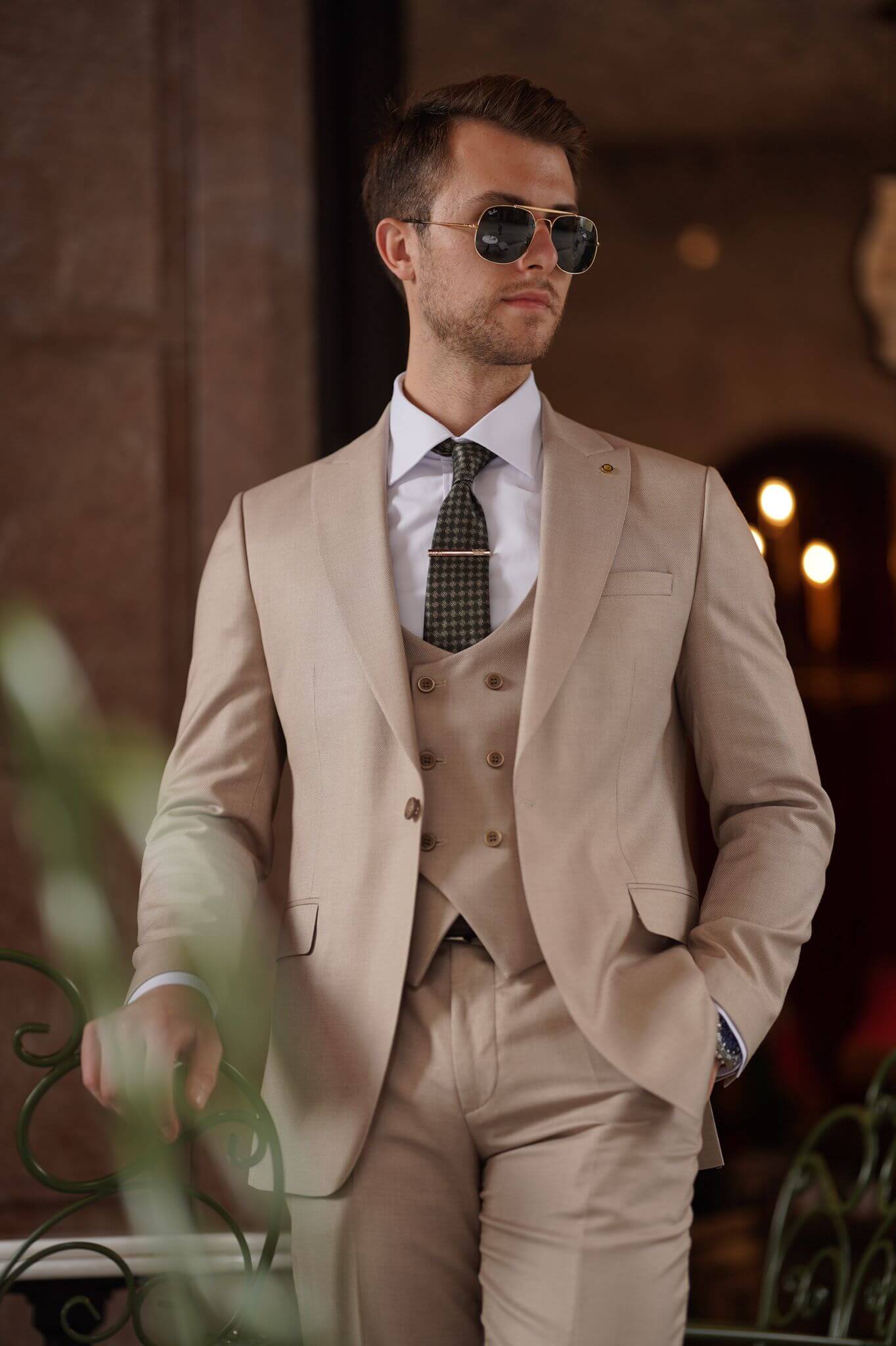 A Slim-Fit Beige Wool Suit on display.
