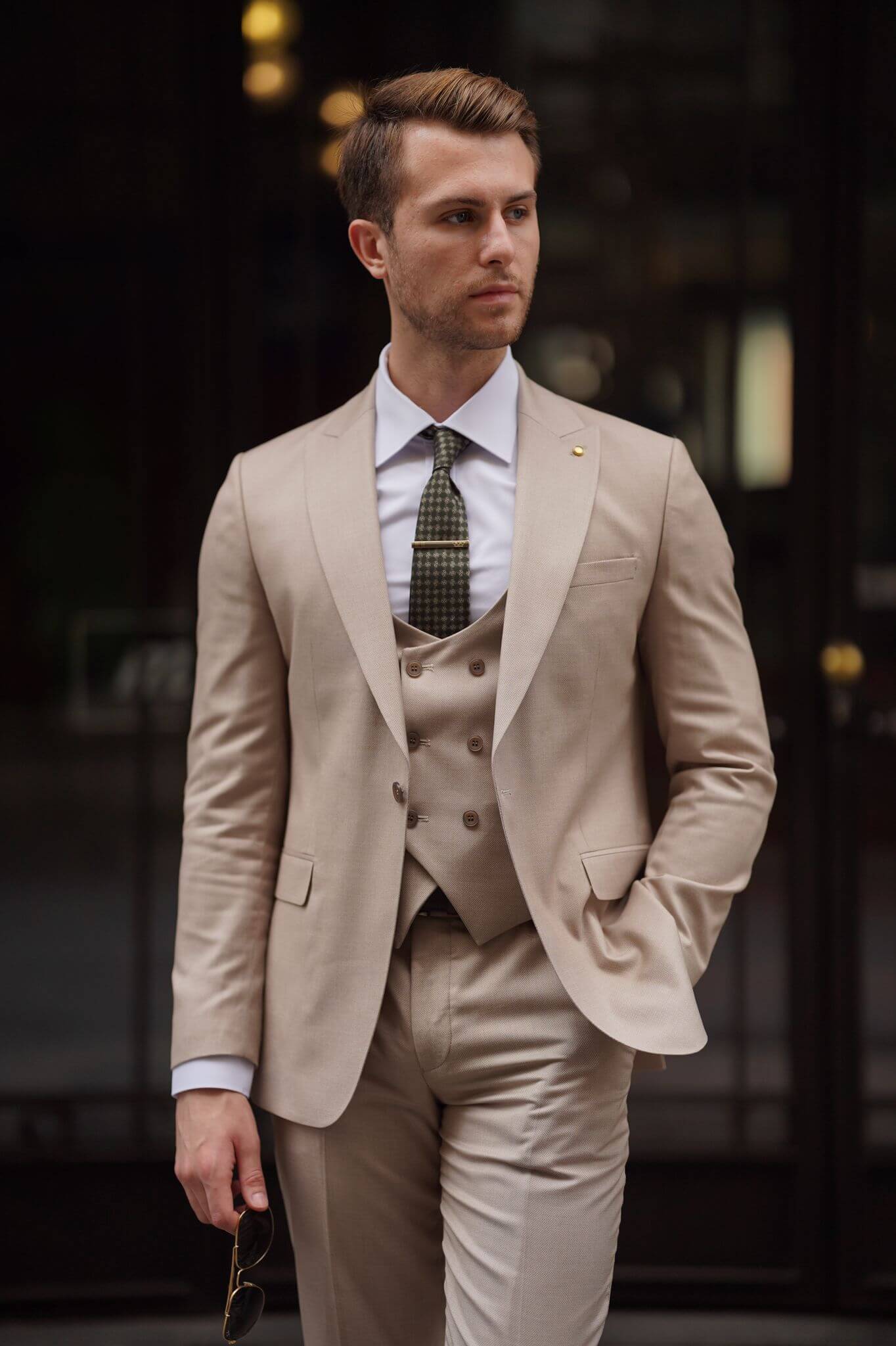 A Slim-Fit Beige Wool Suit on display.