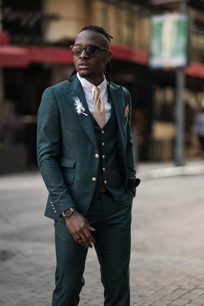 Emerald green slim fit suit.