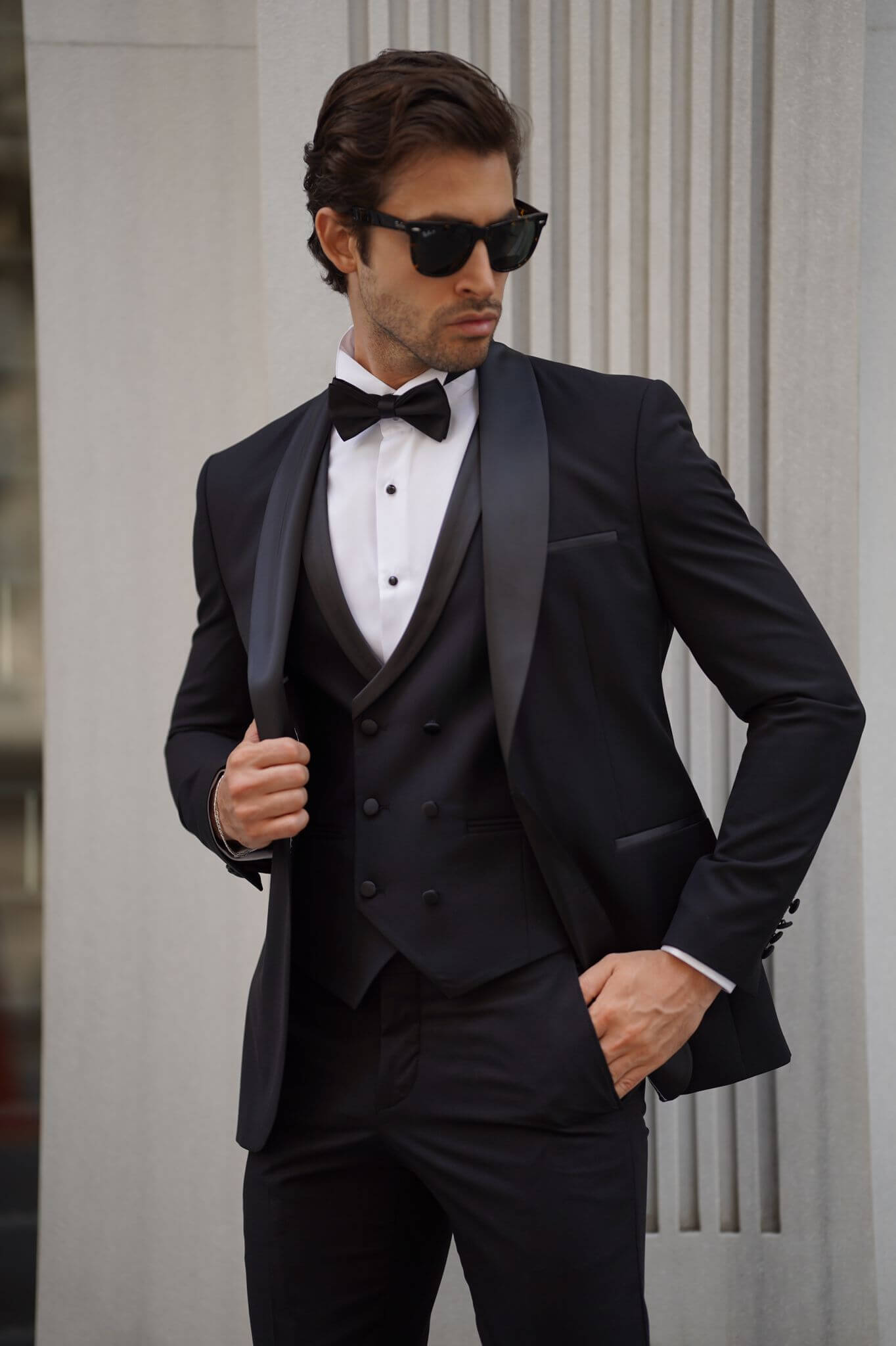 A Slim-Fit Shawl Collar Black Tuxedo Suit on display.