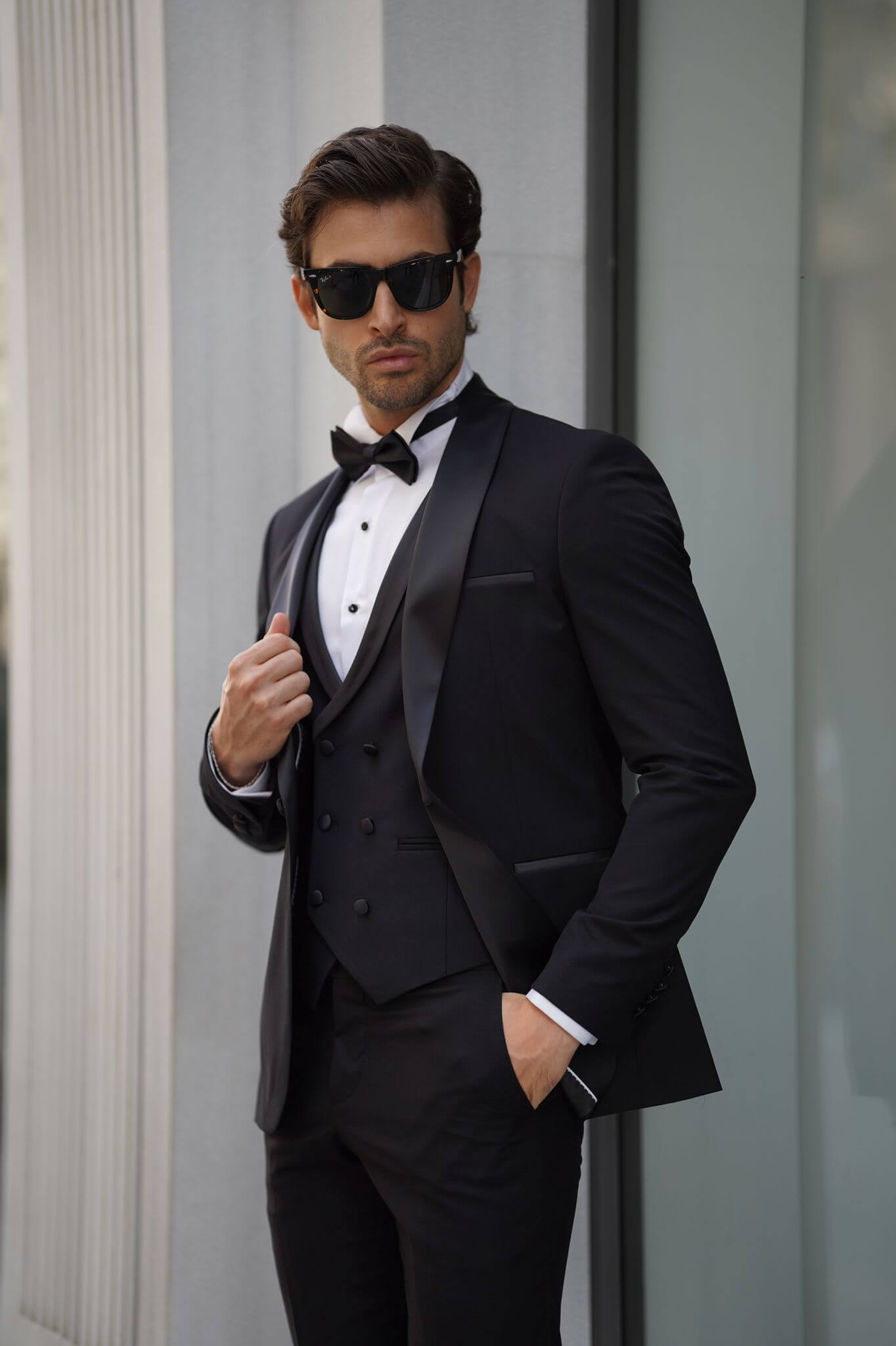 A Slim-Fit Shawl Collar Black Tuxedo Suit on display.