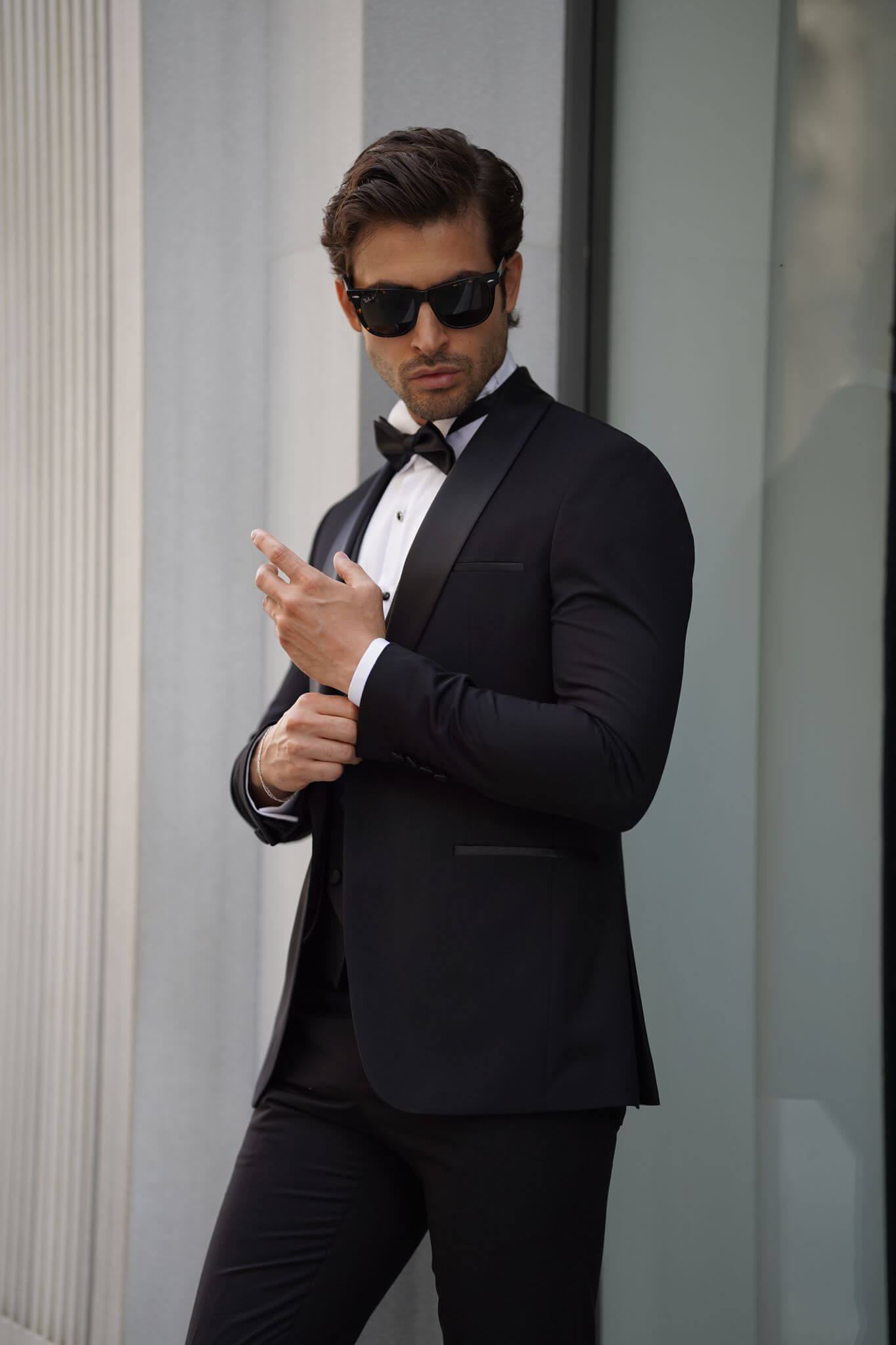 A Slim-Fit Shawl Collar Black Tuxedo Suit on display.
