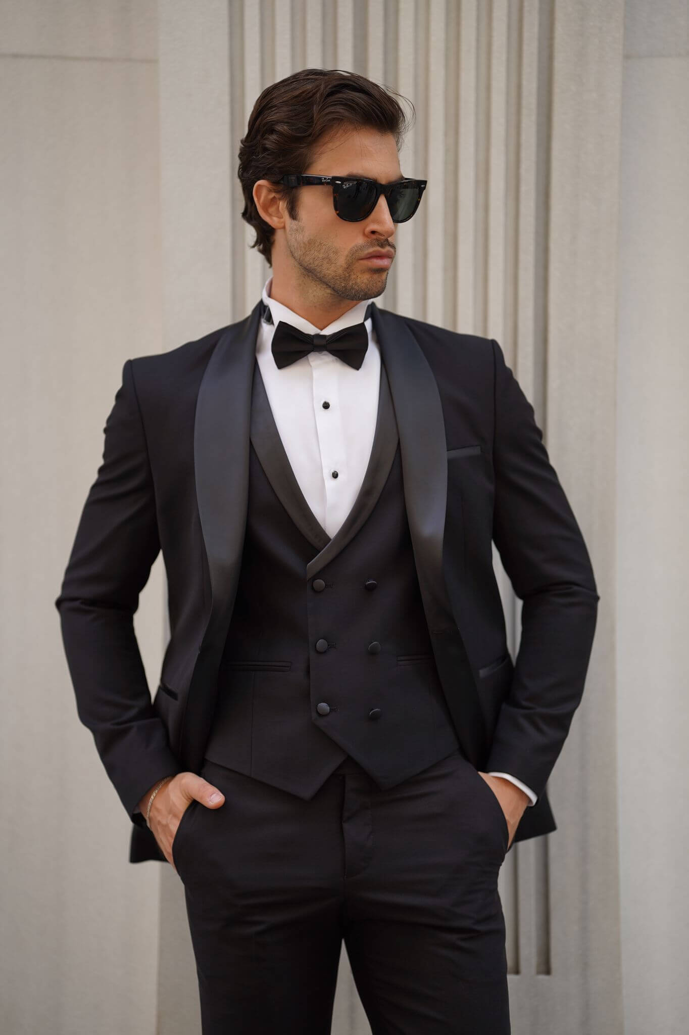 A Slim-Fit Shawl Collar Black Tuxedo Suit on display.