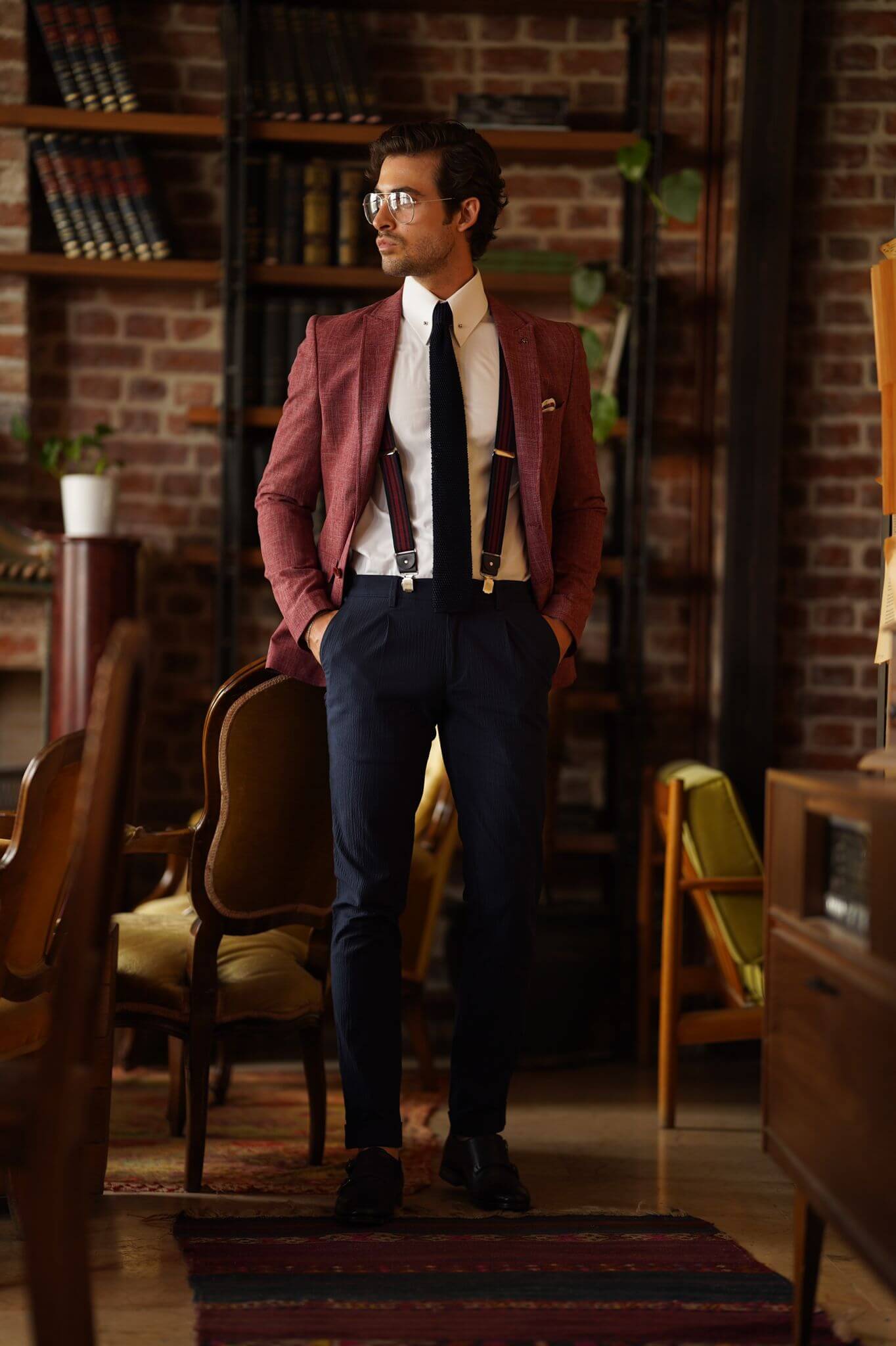 A Slim-Fit Self patterned Cotton Claret Red Blazer on display.
