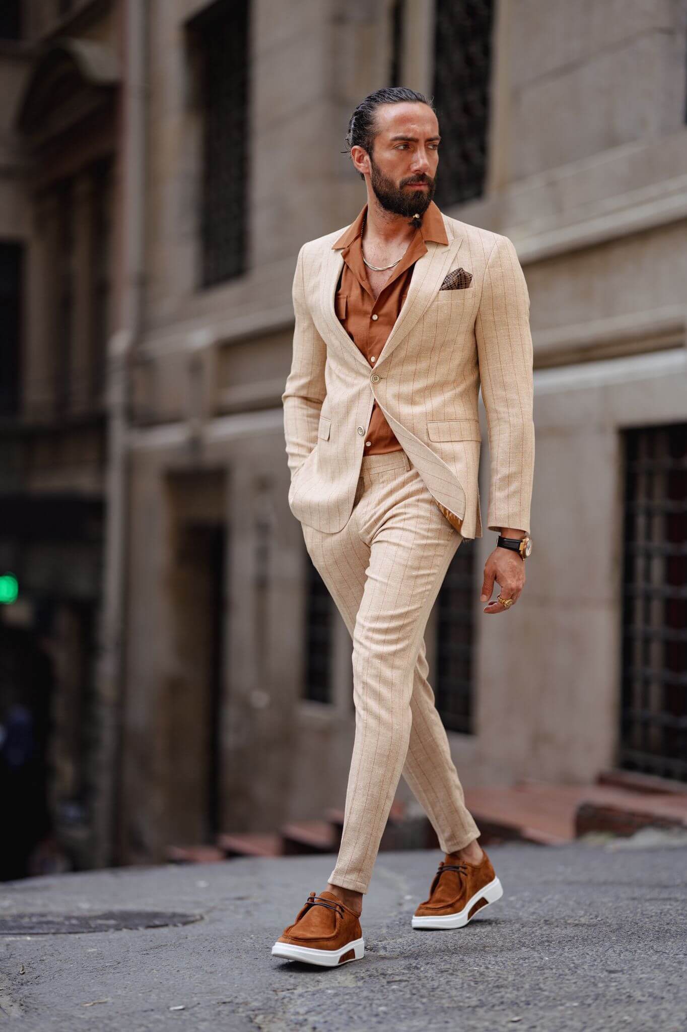 Men's beige linen suit with stripes