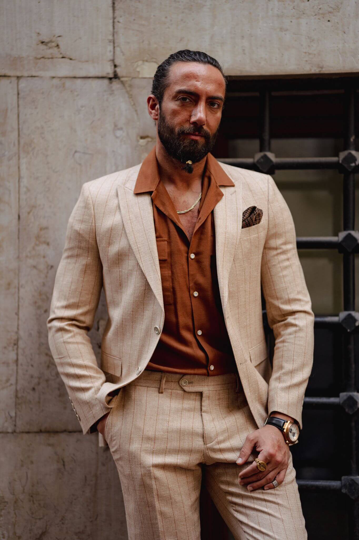 Men's beige linen suit with stripes