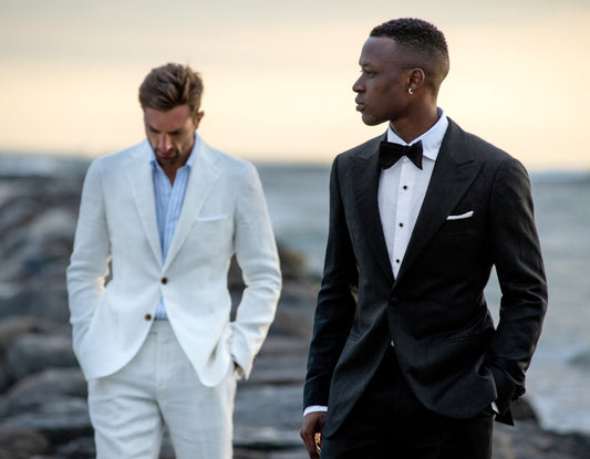 2 men attending a beach wedding