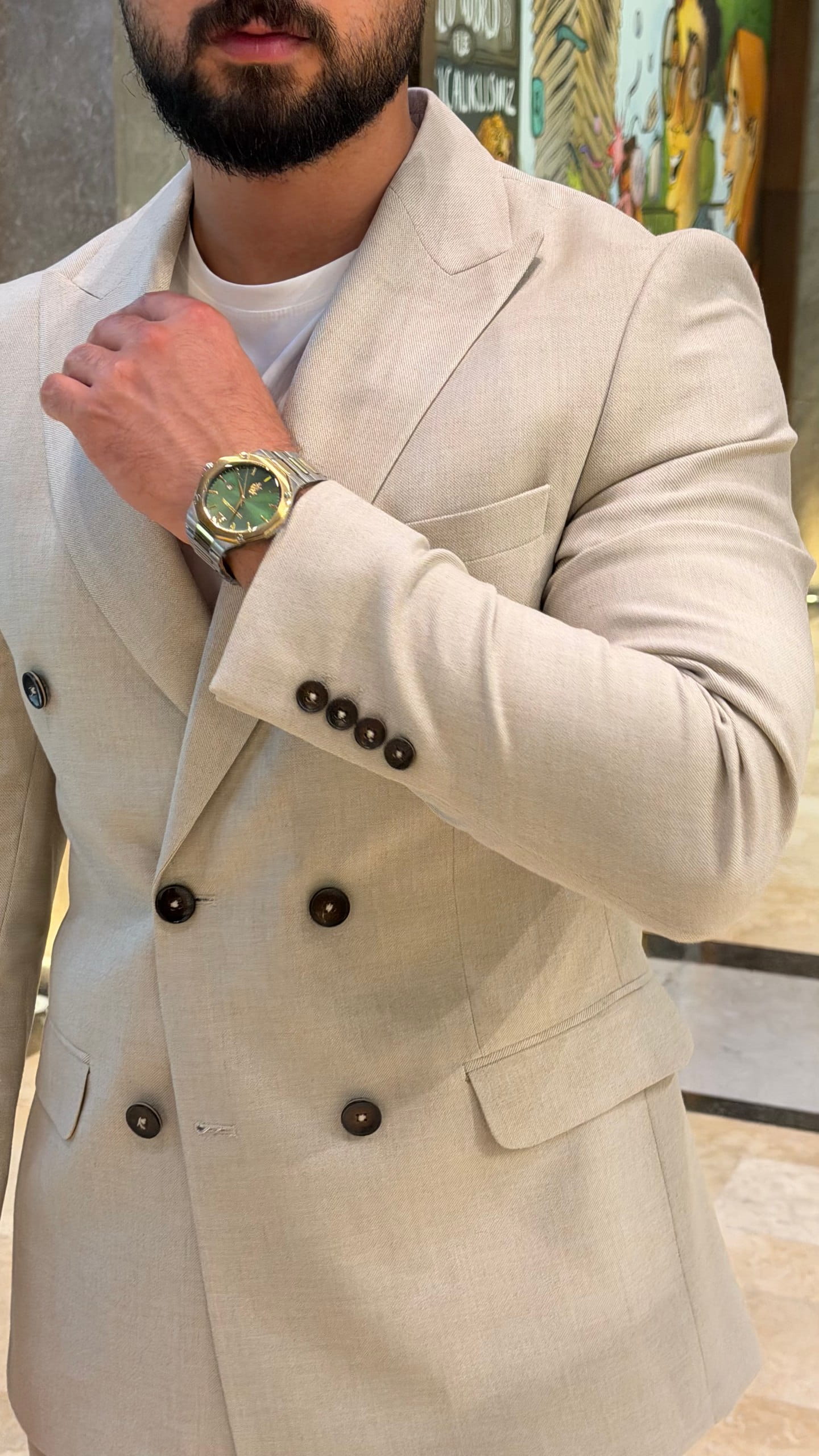 Beige two-piece suit styled for a daytime formal event