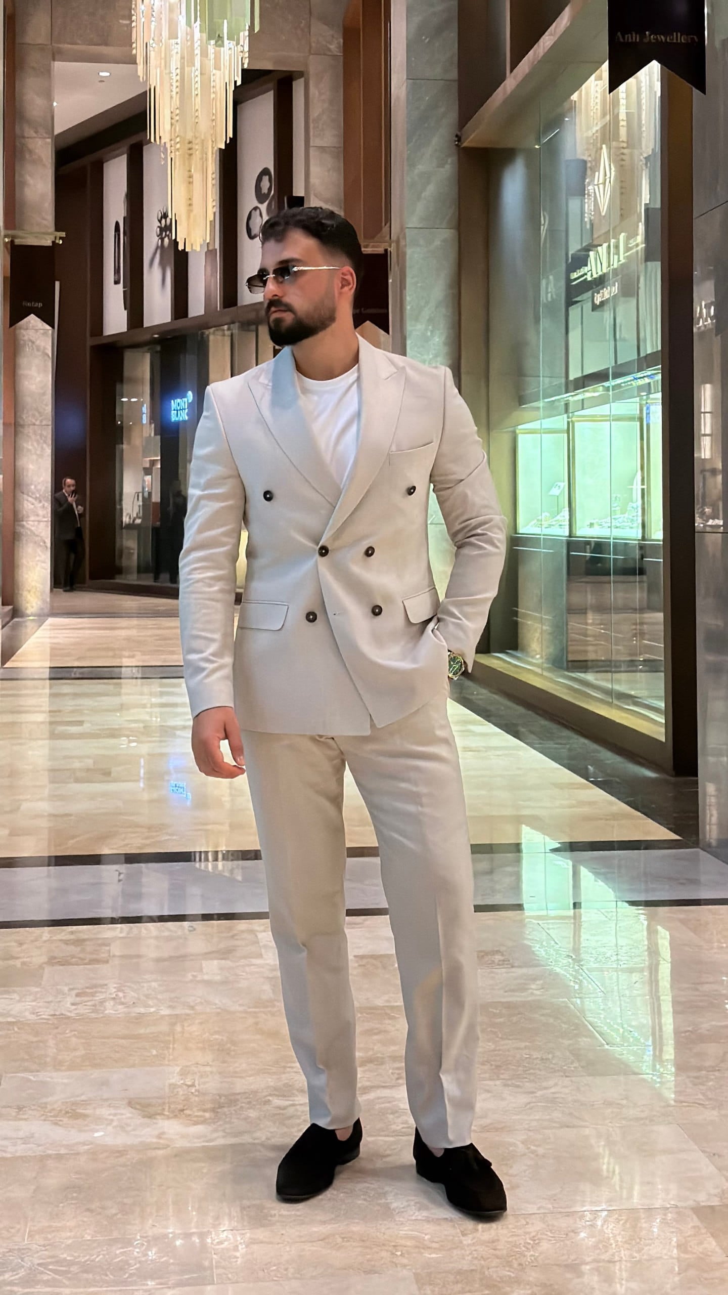 Men's beige double-breasted two-piece suit front view