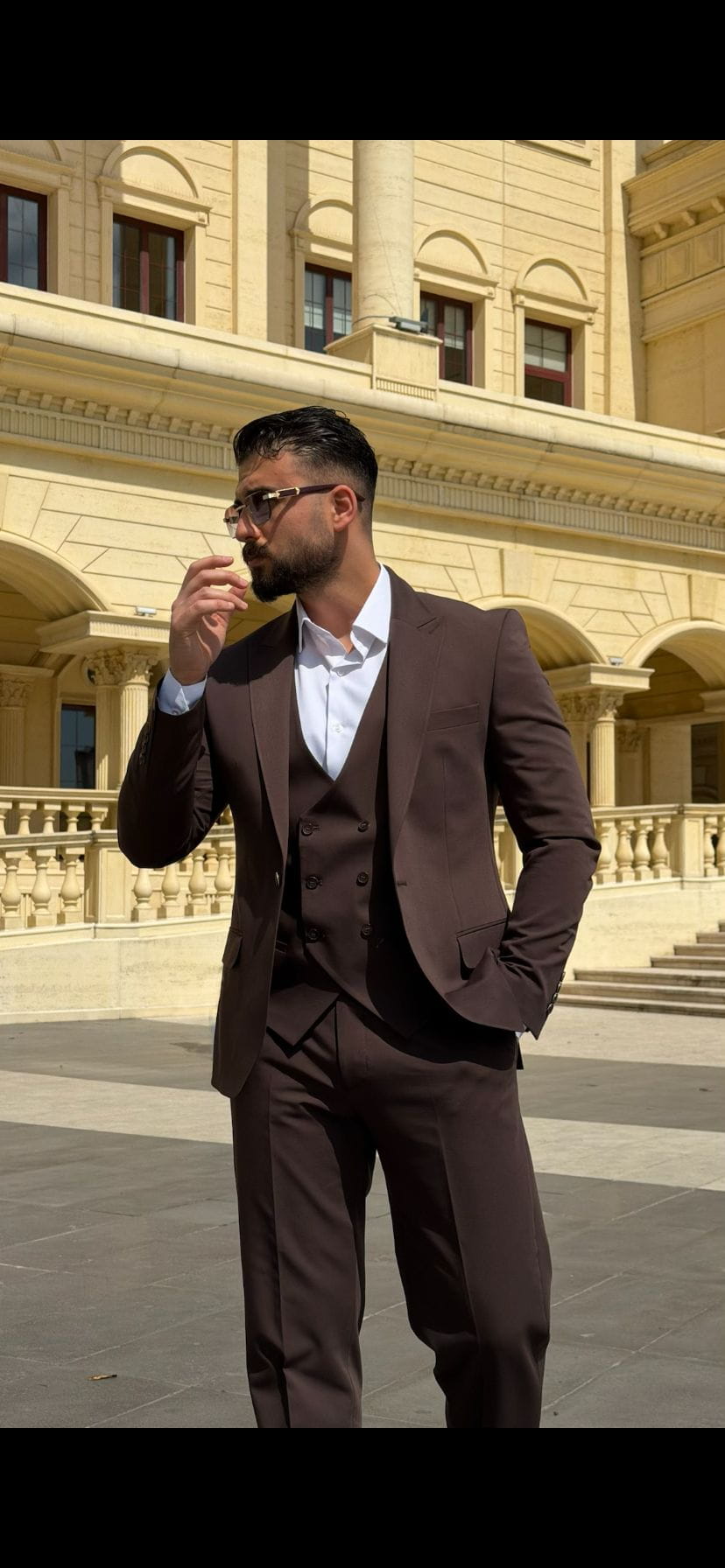 Men's slim fit brown suit with a smooth structured suiting appearance