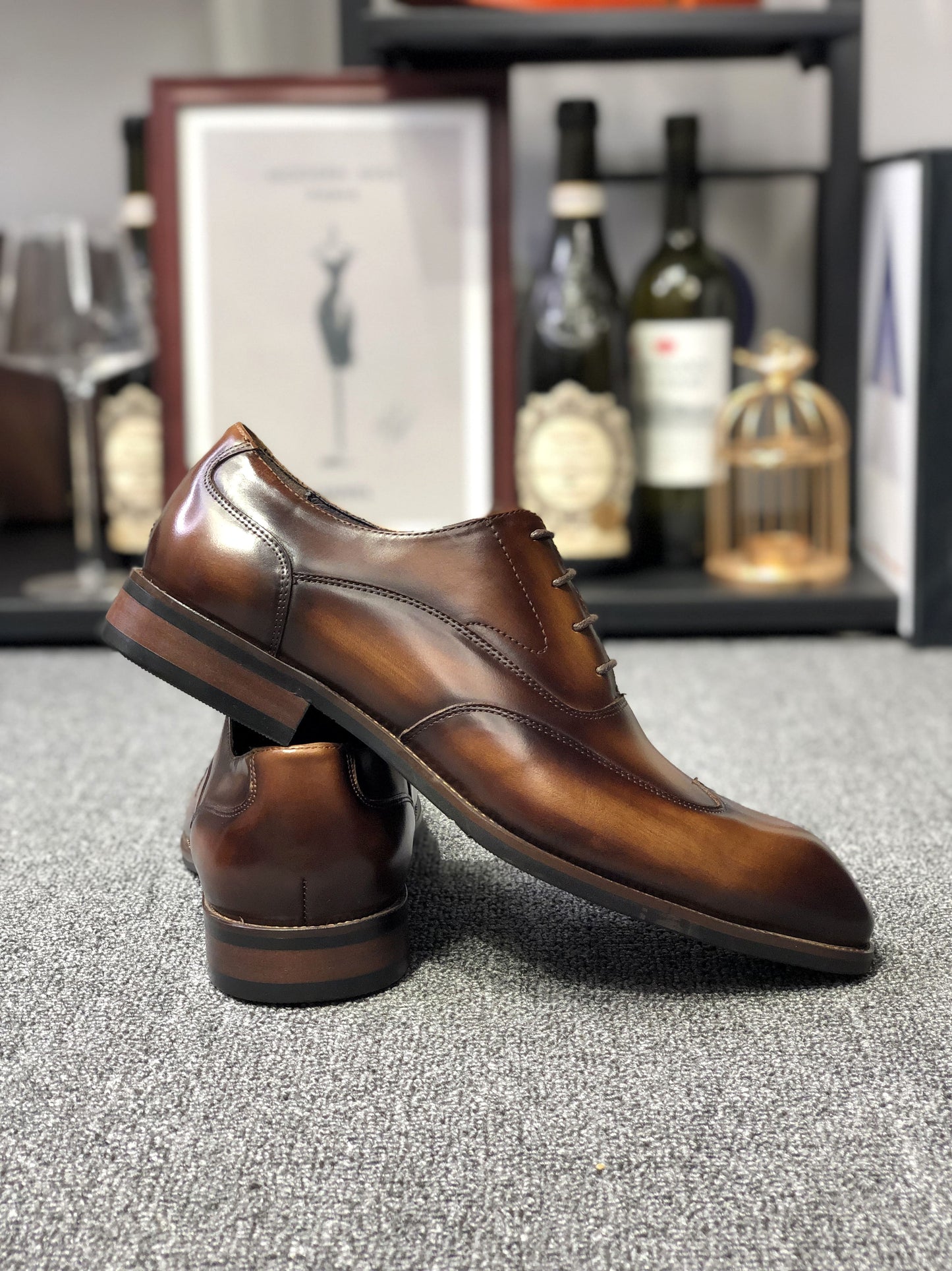 A pair of polished Formal Brown Leather Oxford Shoes, showcasing a sleek and elegant design, perfect for formal wear and professional settings.