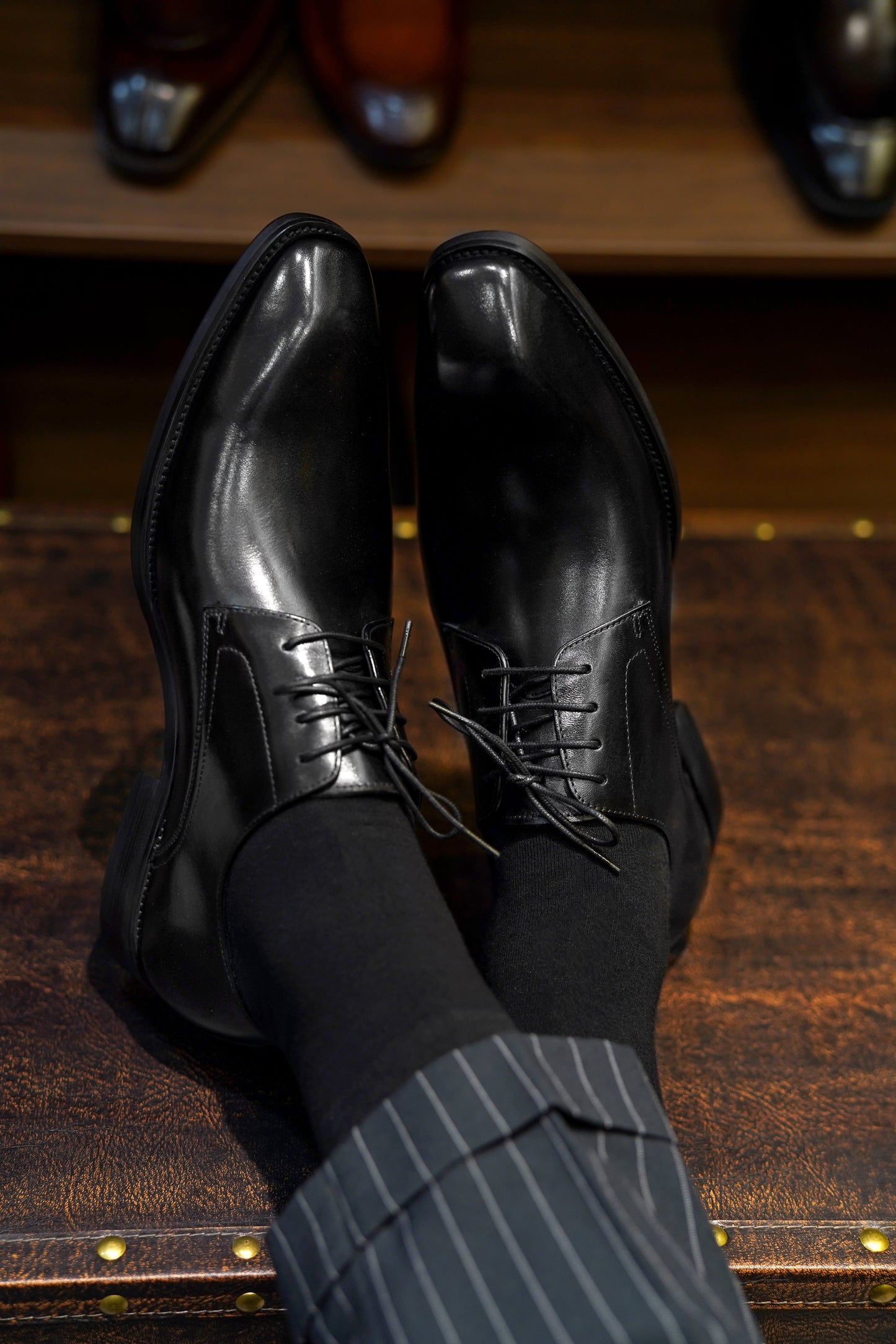 A pair of Classic Black Derby Shoes, crafted from premium leather, perfect for men’s formal and business wear.