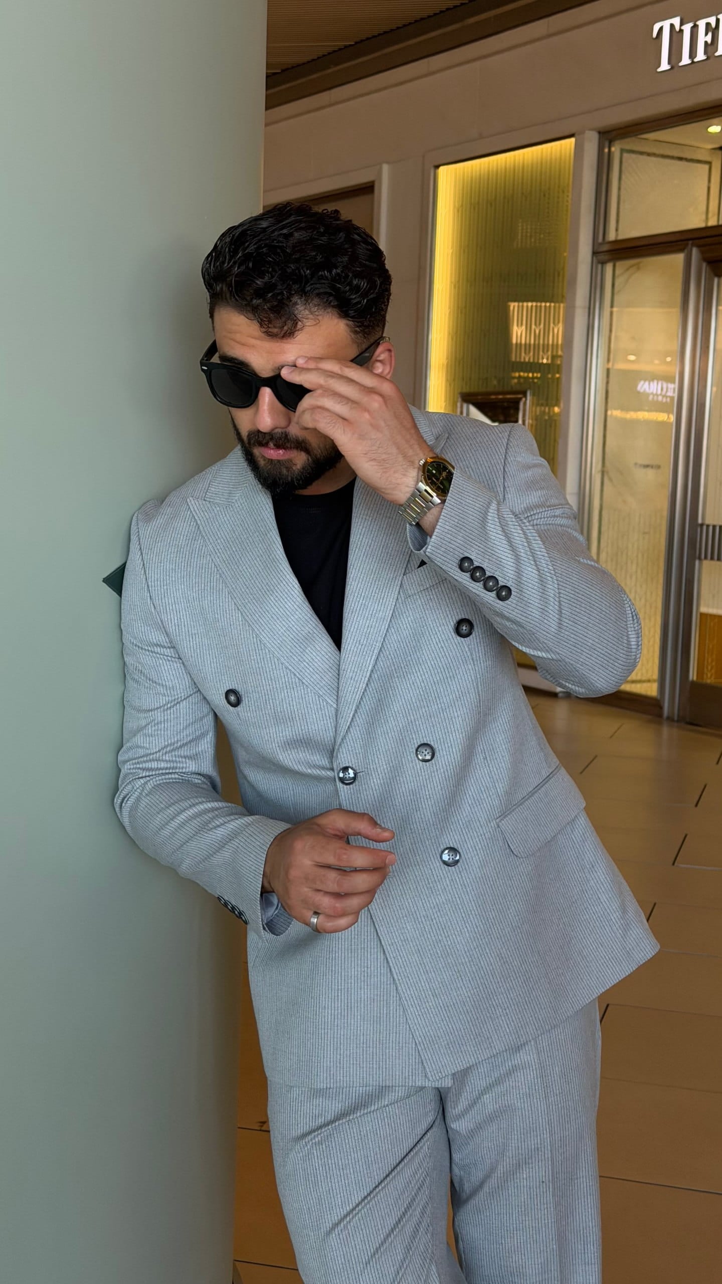 Full-length ribbed gray formal suit with matching trousers