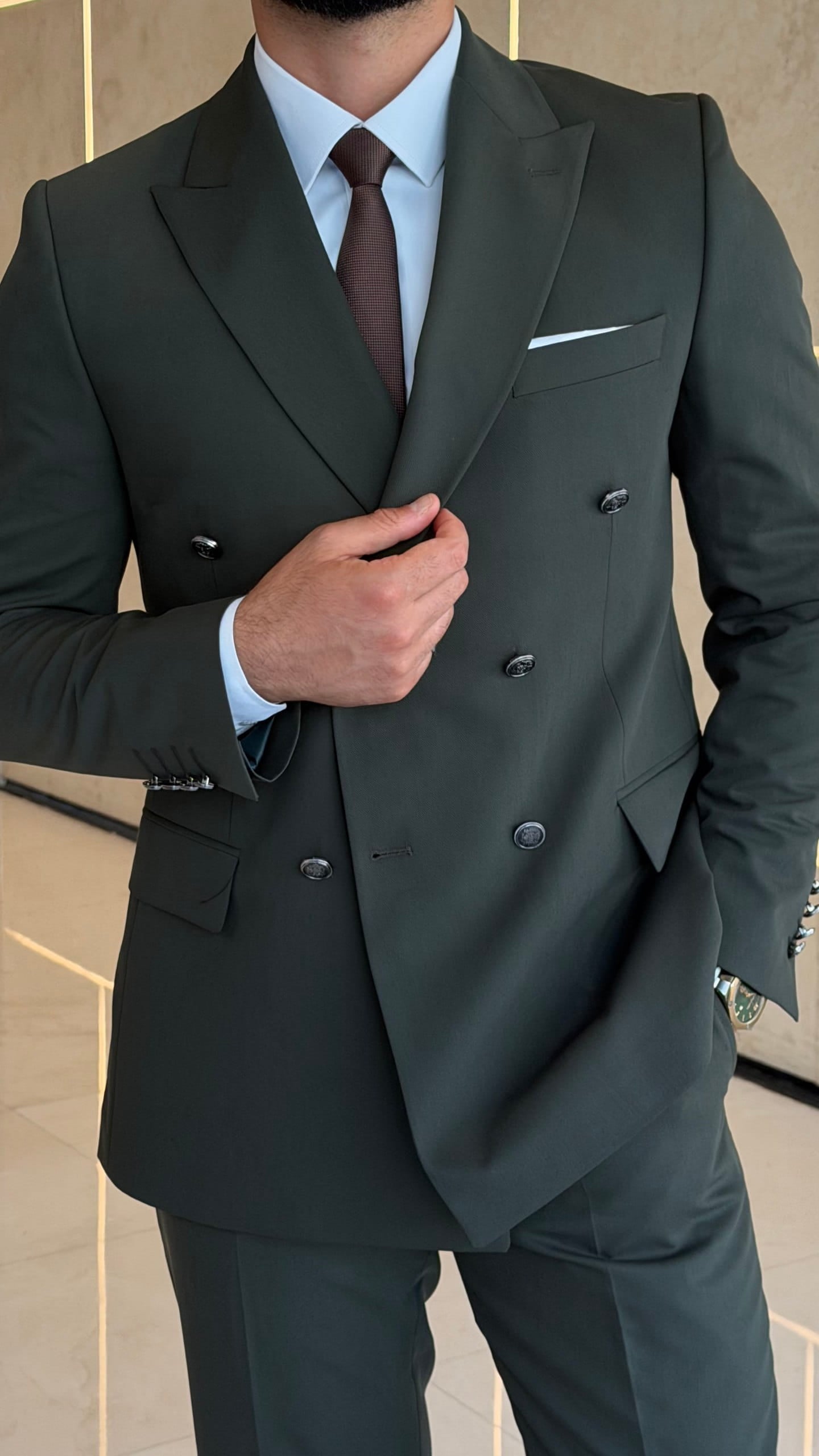 Khaki two-piece formal suit with flap-pocket styling