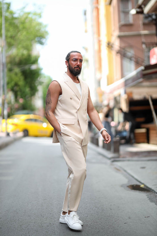 Man in a Beige Short-Sleeve Tailored Summer Suit walking on a city street.