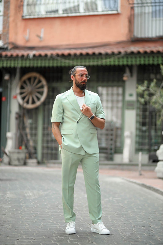 Front view of men’s green lightweight summer suit for weddings and parties.