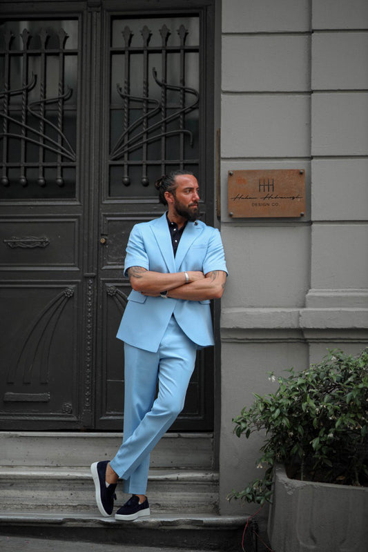 Men’s light blue slim fit summer suit – short sleeve blazer with tailored trousers, front view