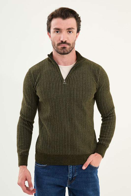 Man wearing a green ribbed sweater with a zipper on a white background