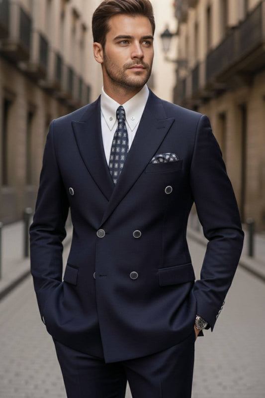 Man wearing a navy suit with a patterned tie in an urban setting
